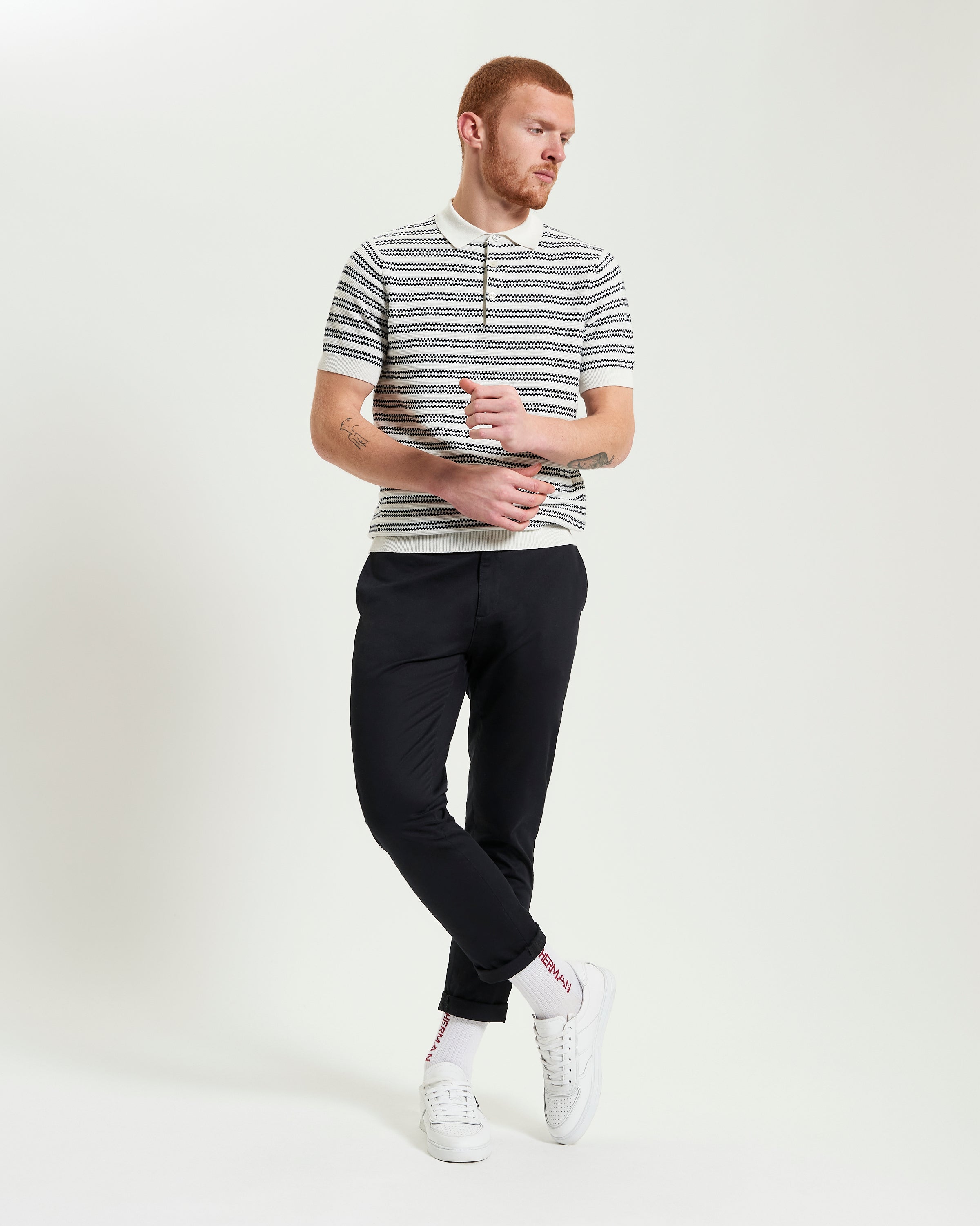 Jacquard Stripe Polo – short-sleeve knit with intricate stripe pattern, ribbed collar, and 3-button placket.