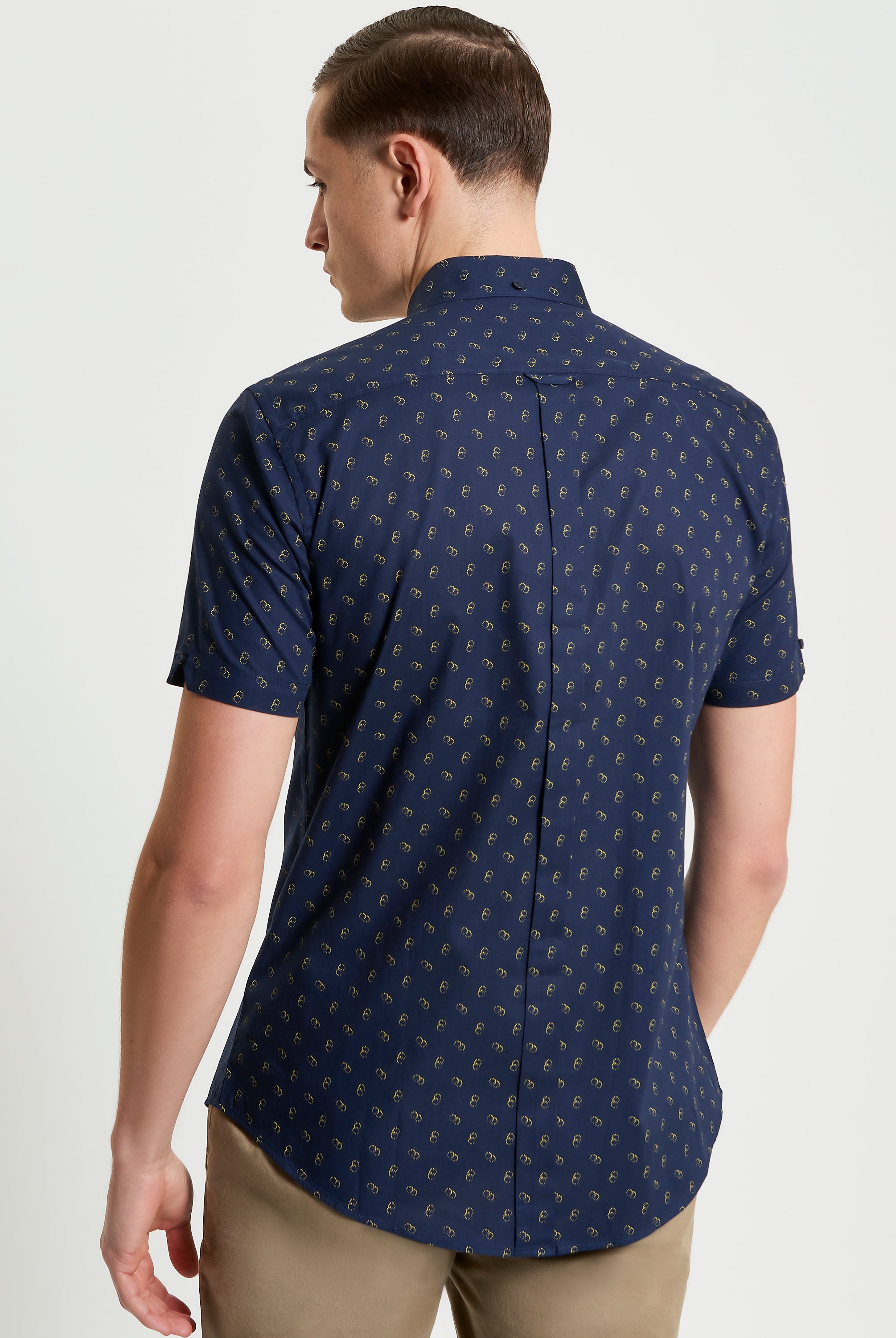 Stipple Print Shirt – Back view showcasing organic cotton fabric and curved hem.
