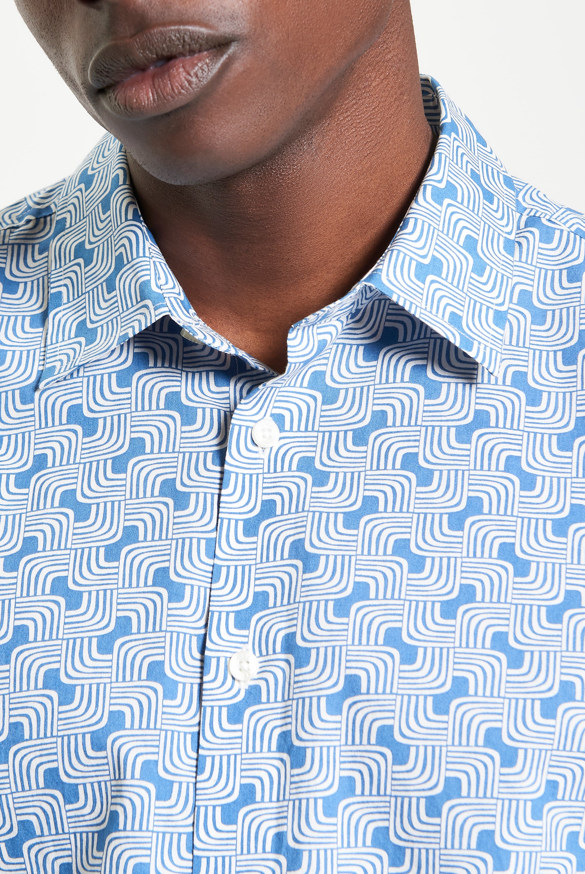 Linear Print – Blue patterned shirt with casual point collar and regular fit.
