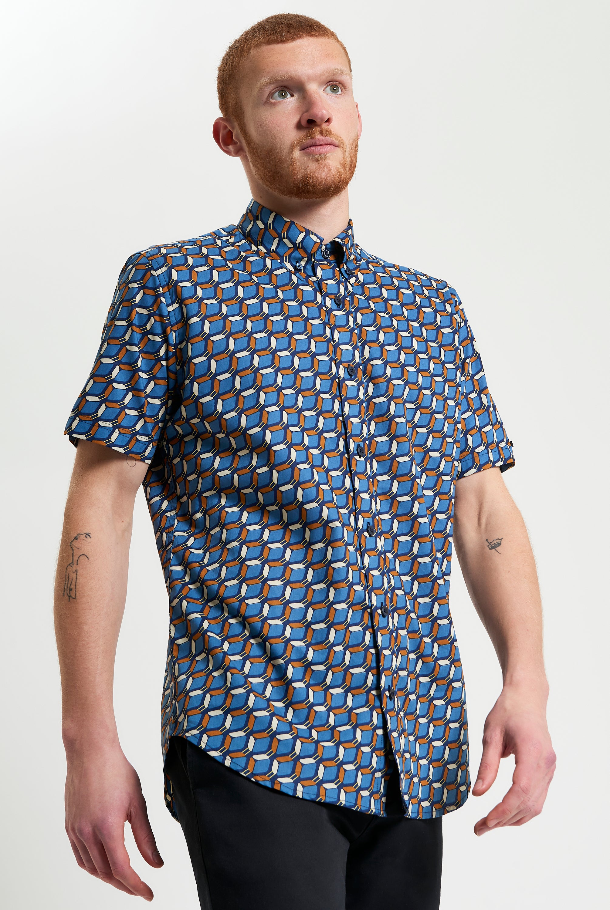 Retro Geo Print shirt featuring bold vintage-inspired design and vibrant geometric pattern.
