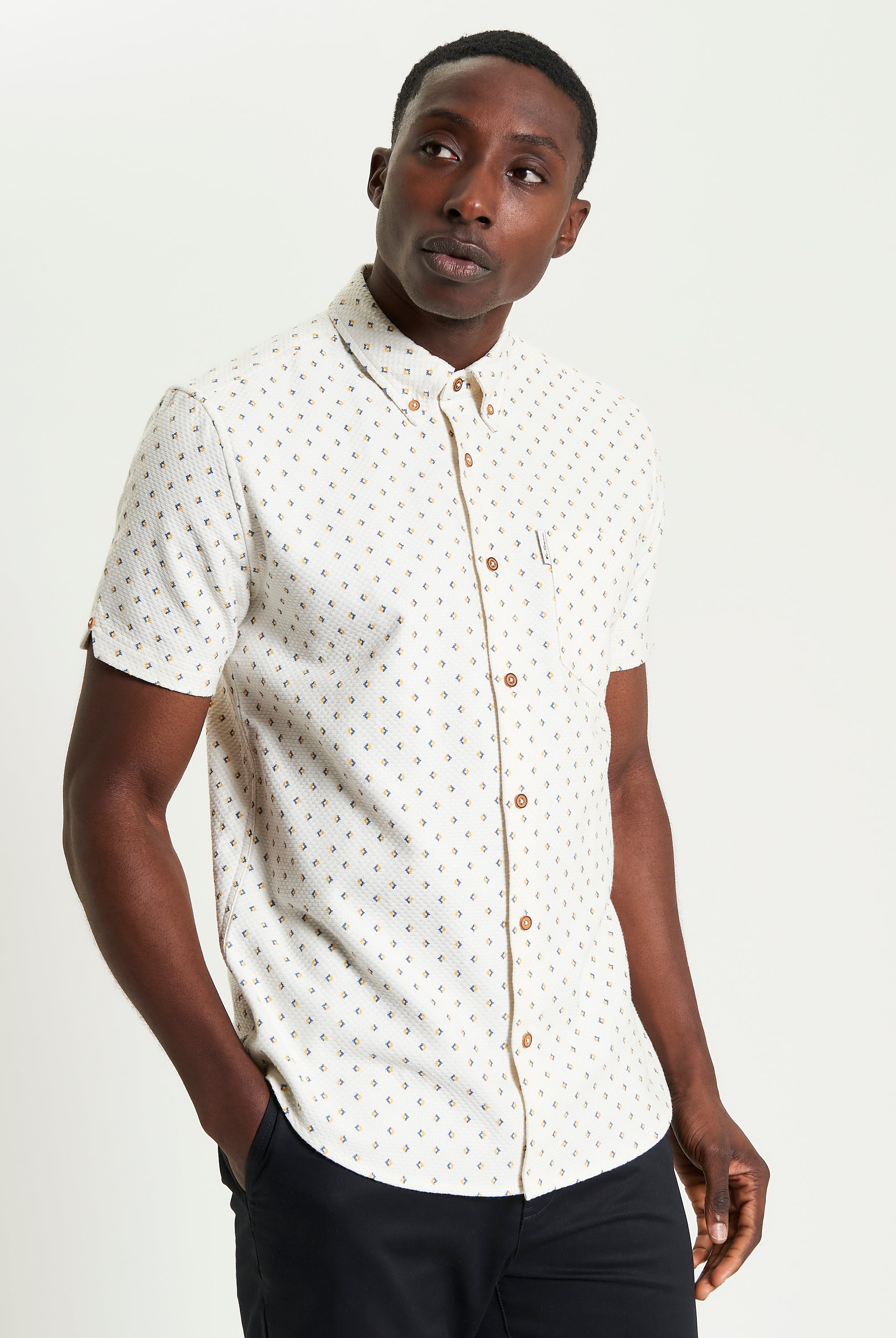 Split Geo Print short-sleeve shirt featuring a two-finger button-down collar and a regular fit.