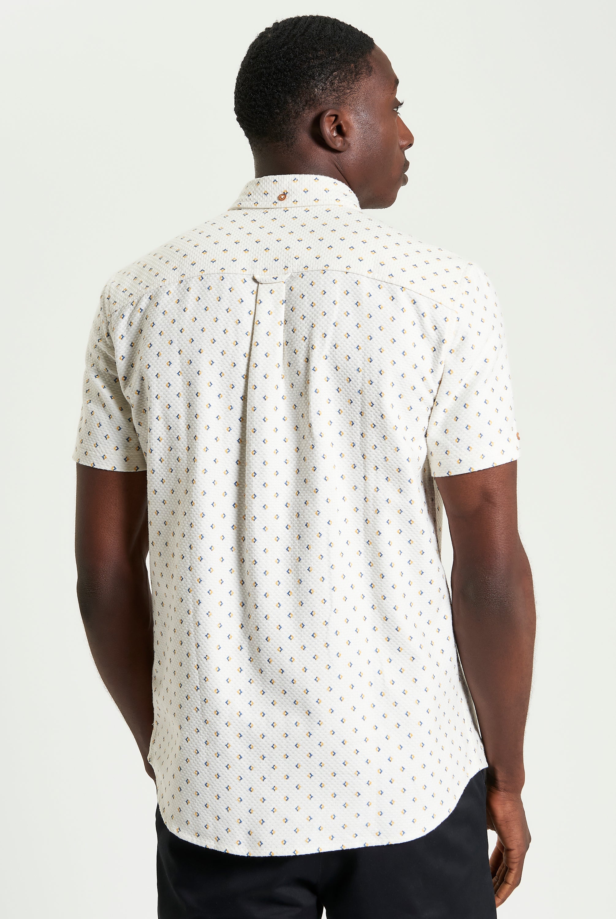 Split Geo Print short-sleeve shirt back view features bold split geo pattern and two-finger button-down collar.