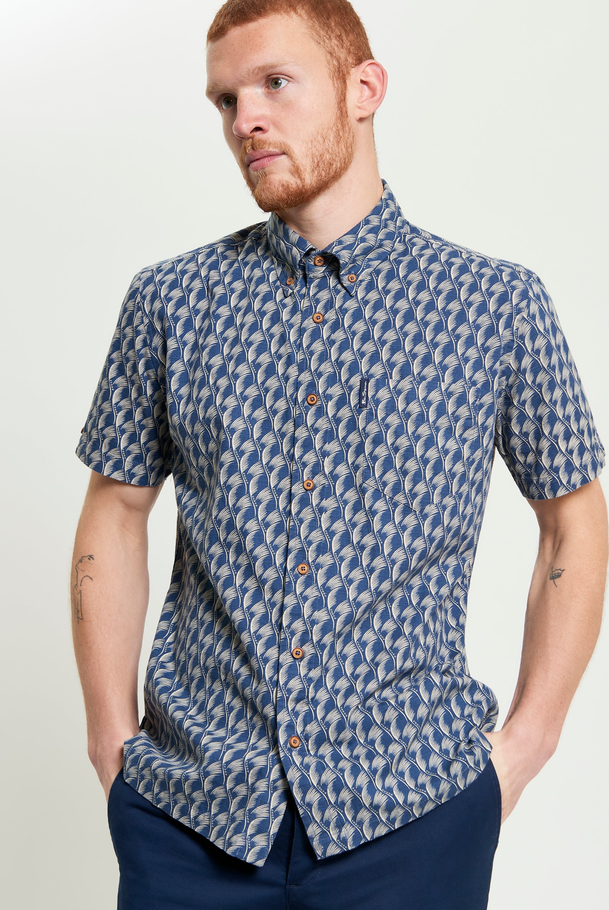 Block Leaf Print Shirt featuring a bold leaf pattern, crafted from cotton with a button-down collar.