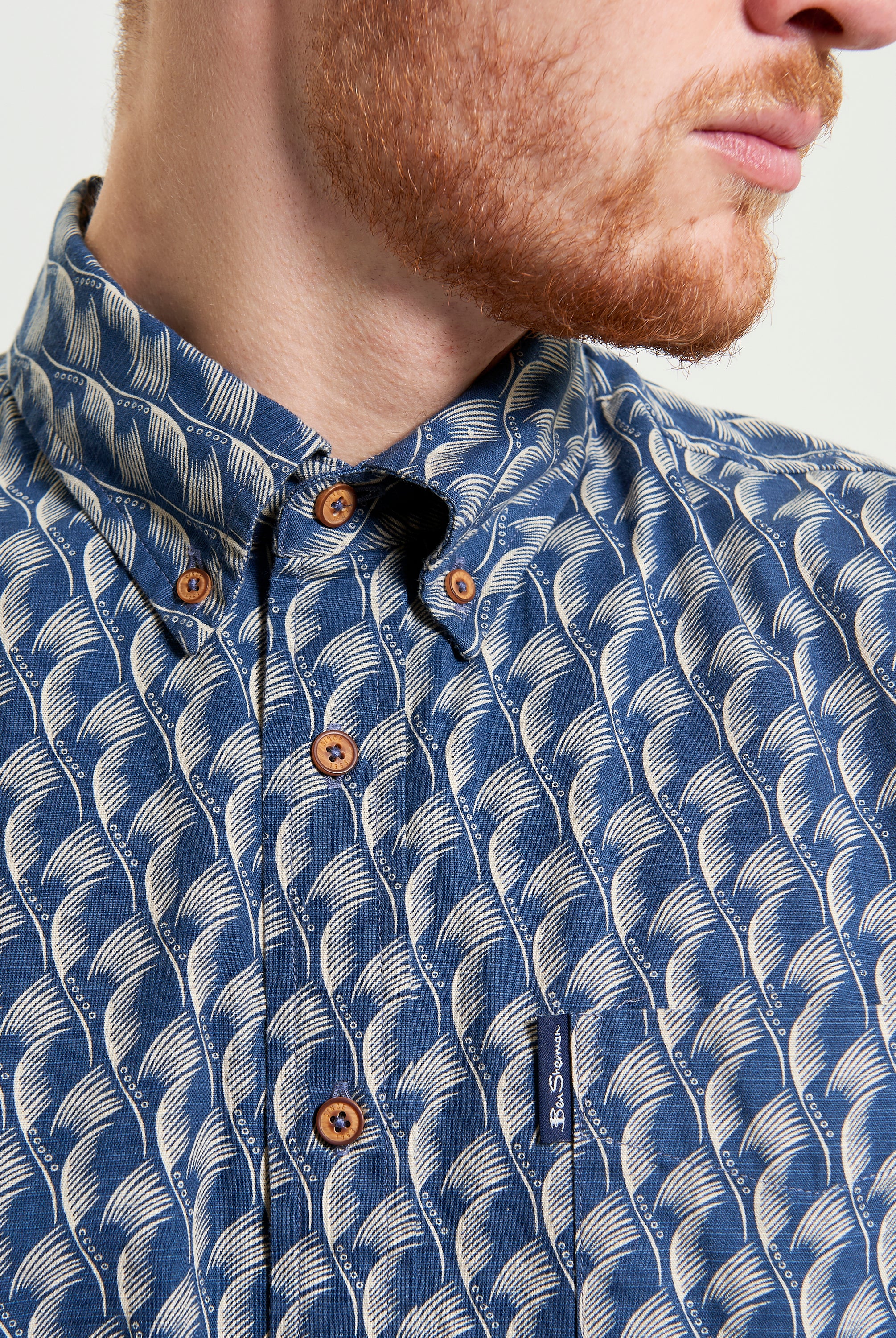 Block Leaf Print Shirt – Stylish cotton shirt with bold leaf pattern and button-down collar.