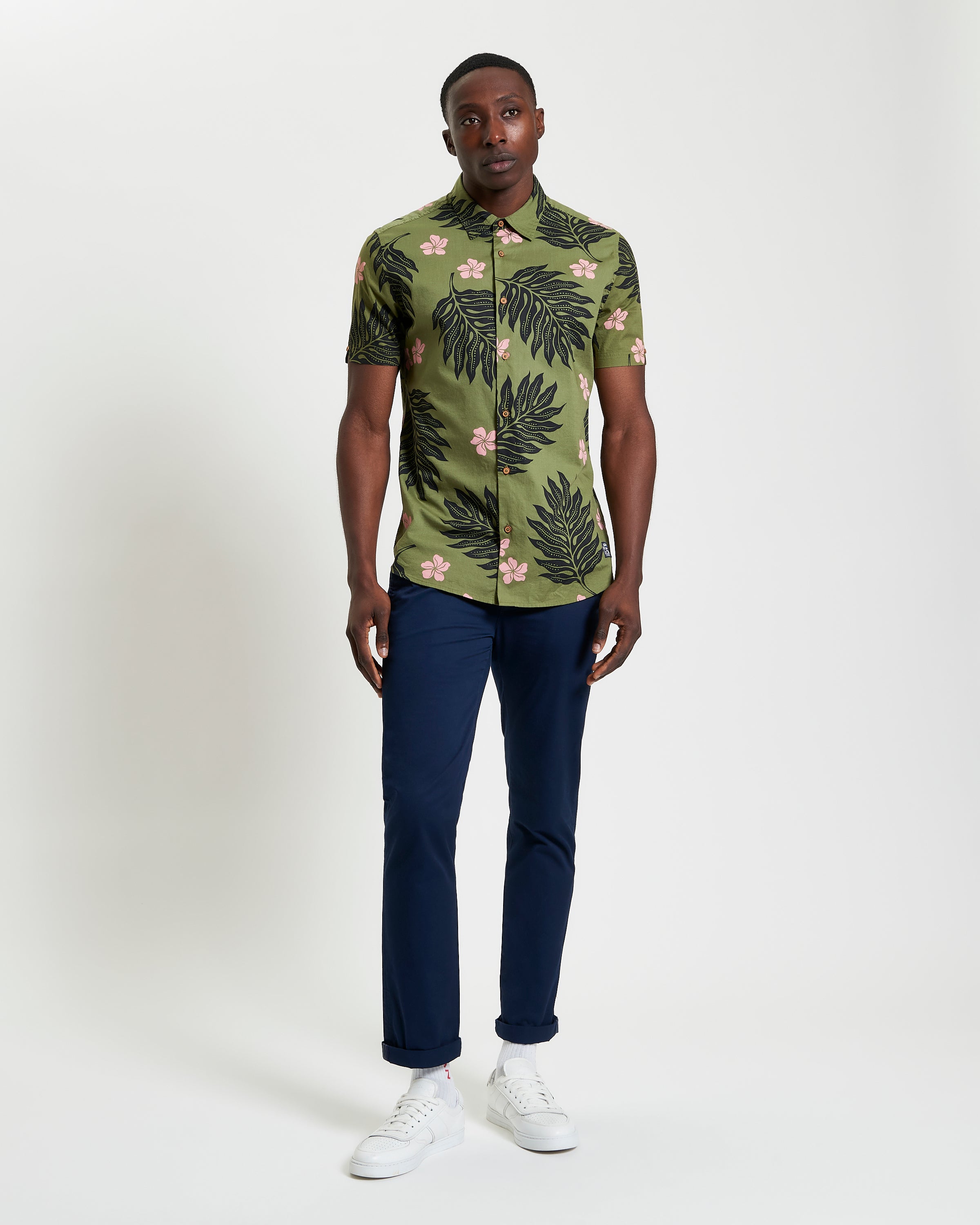 Botanical Print Shirt on model featuring short sleeves and bold botanical pattern, perfect for summer style.