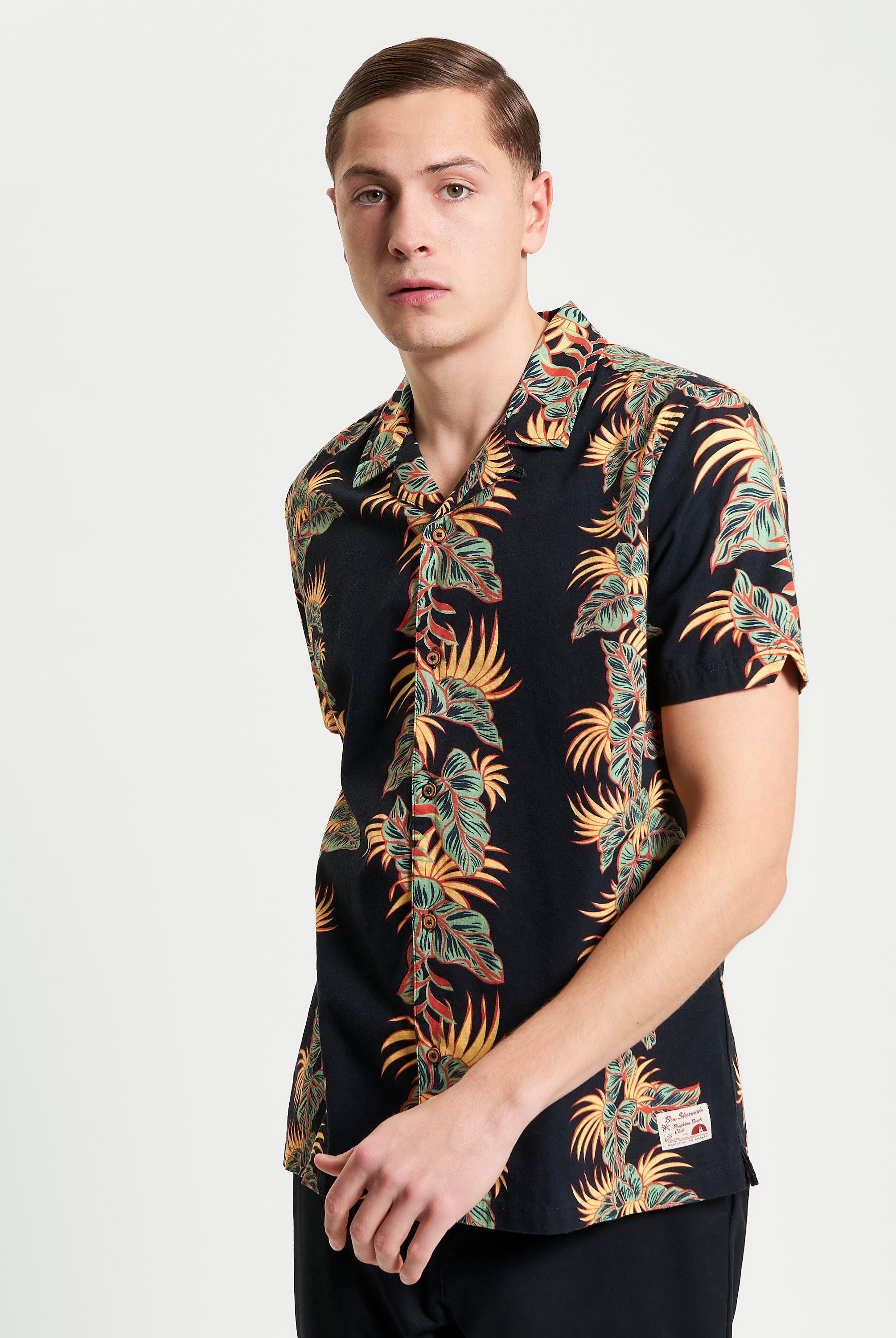 Botanical Leaf Print short sleeve shirt with tropical leaves design and revere collar, perfect for summer.