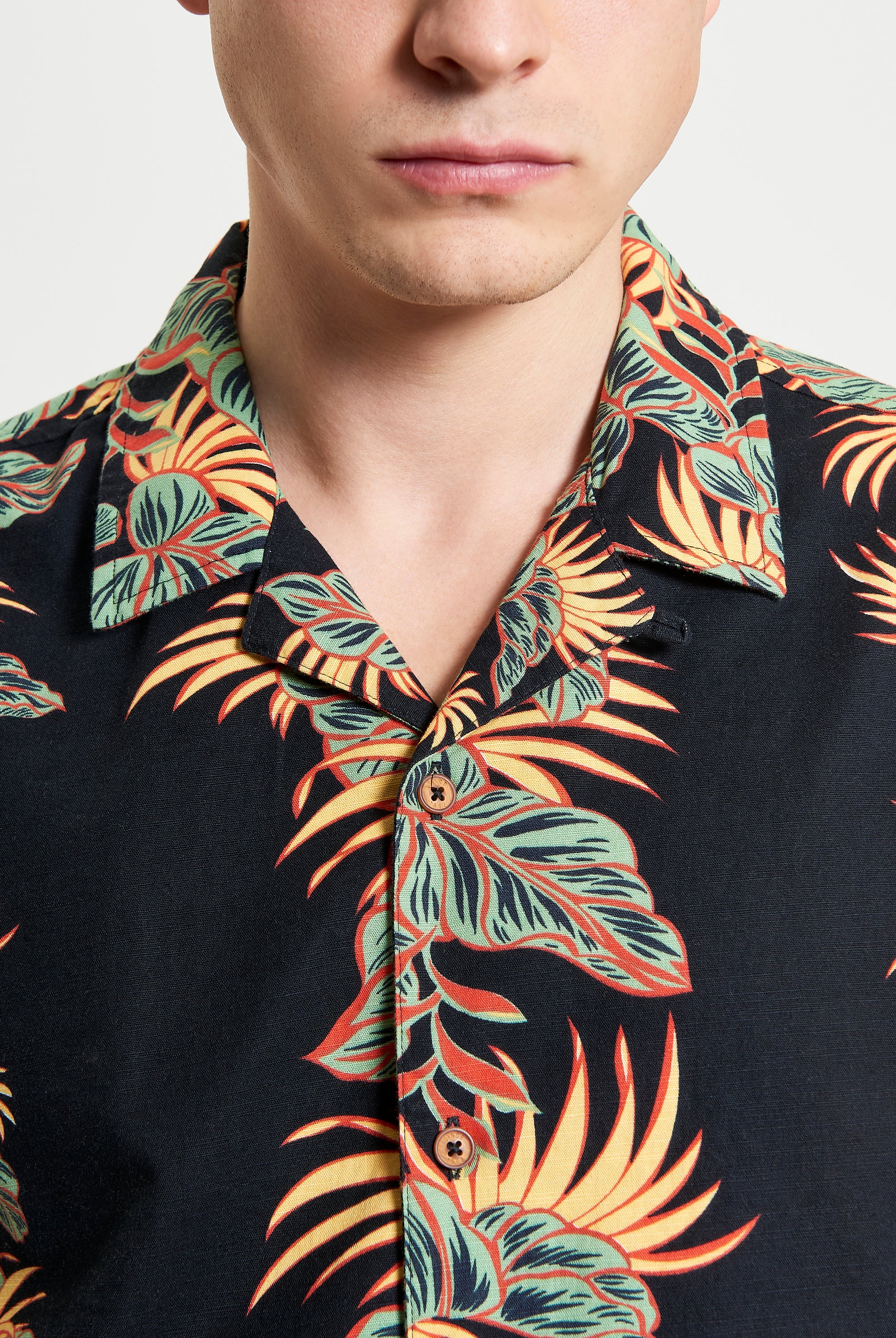 Botanical Leaf Print short sleeve shirt featuring bold leaf motif and revere collar, perfect for summer style.