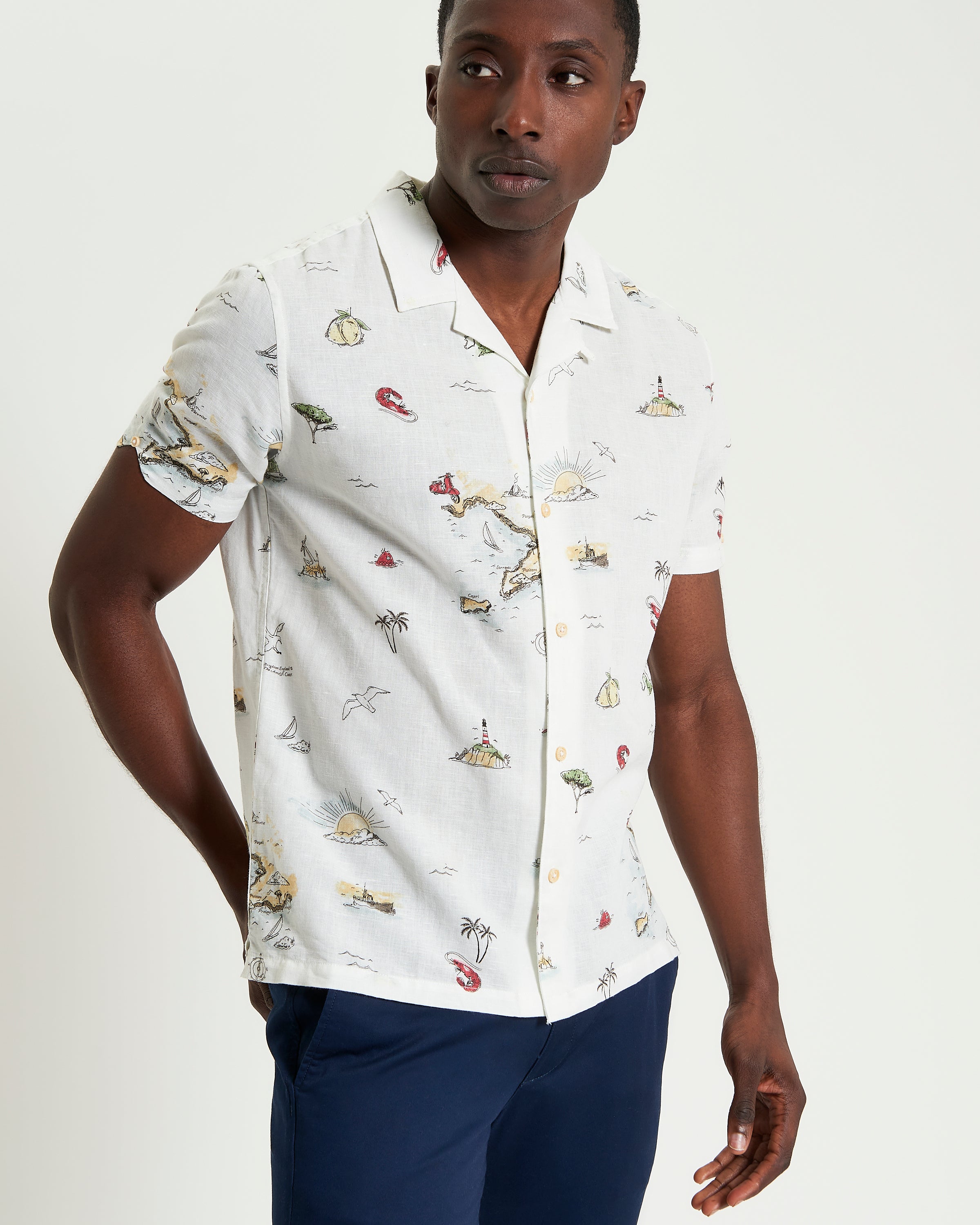 Brighton To Amalfi Print short-sleeve shirt featuring coastal scenes, relaxed fit and open collar for tropical vibes.