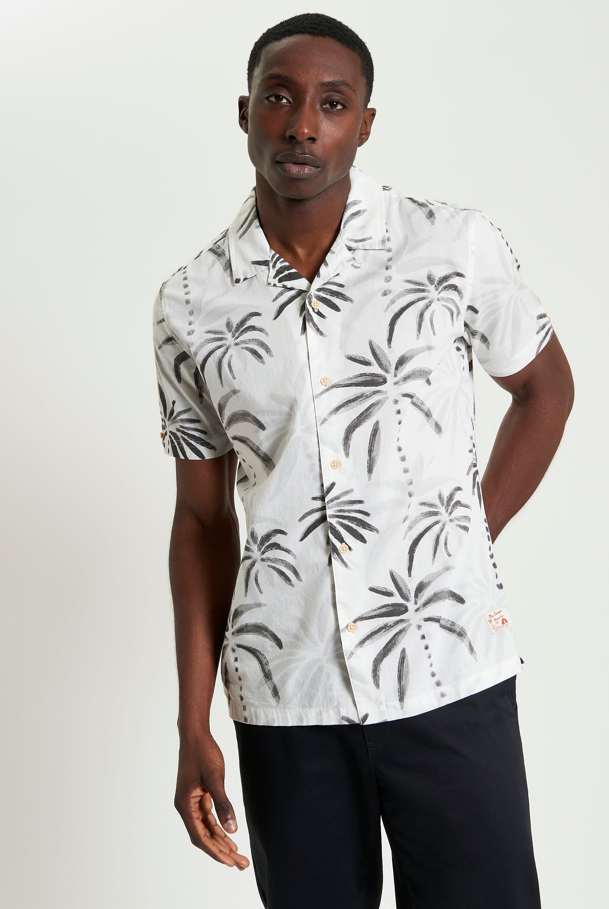 Palm Print Shirt – Short sleeves and relaxed fit with palm tree design for a tropical summer style.
