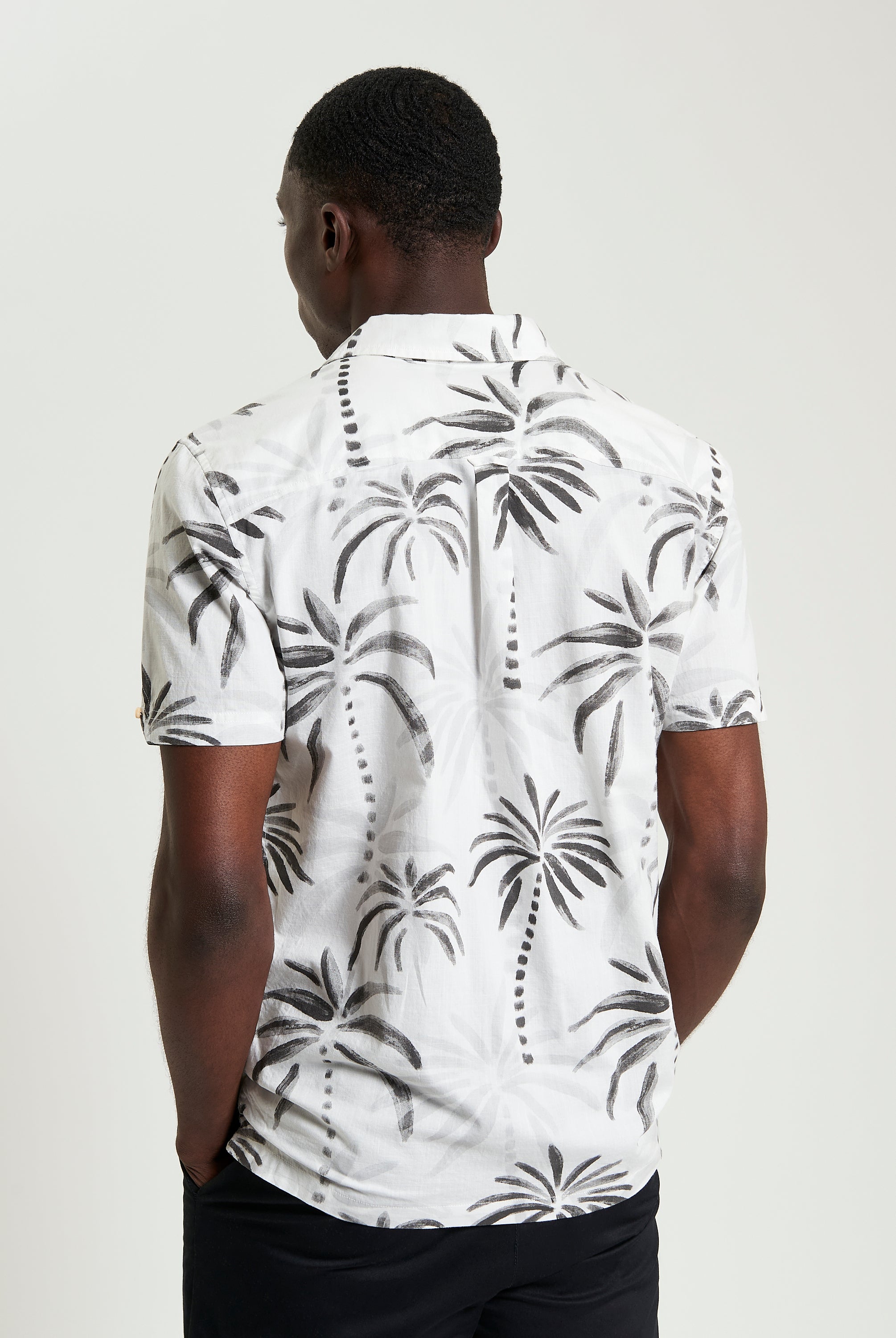 Palm Print Shirt – Relaxed fit with tropical palm design on a breathable cotton fabric.