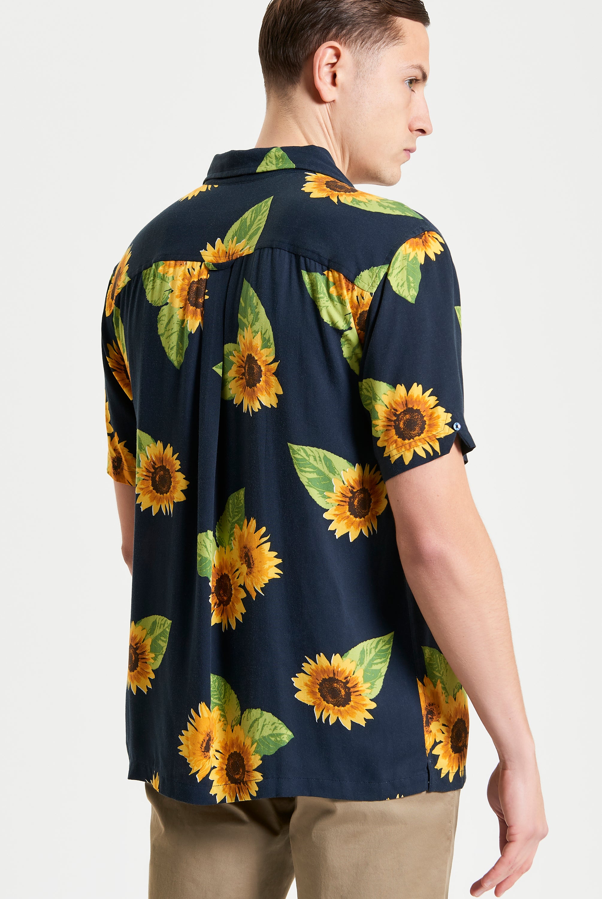 Sunflower Print – Back view of the shirt featuring a vibrant sunflower pattern.