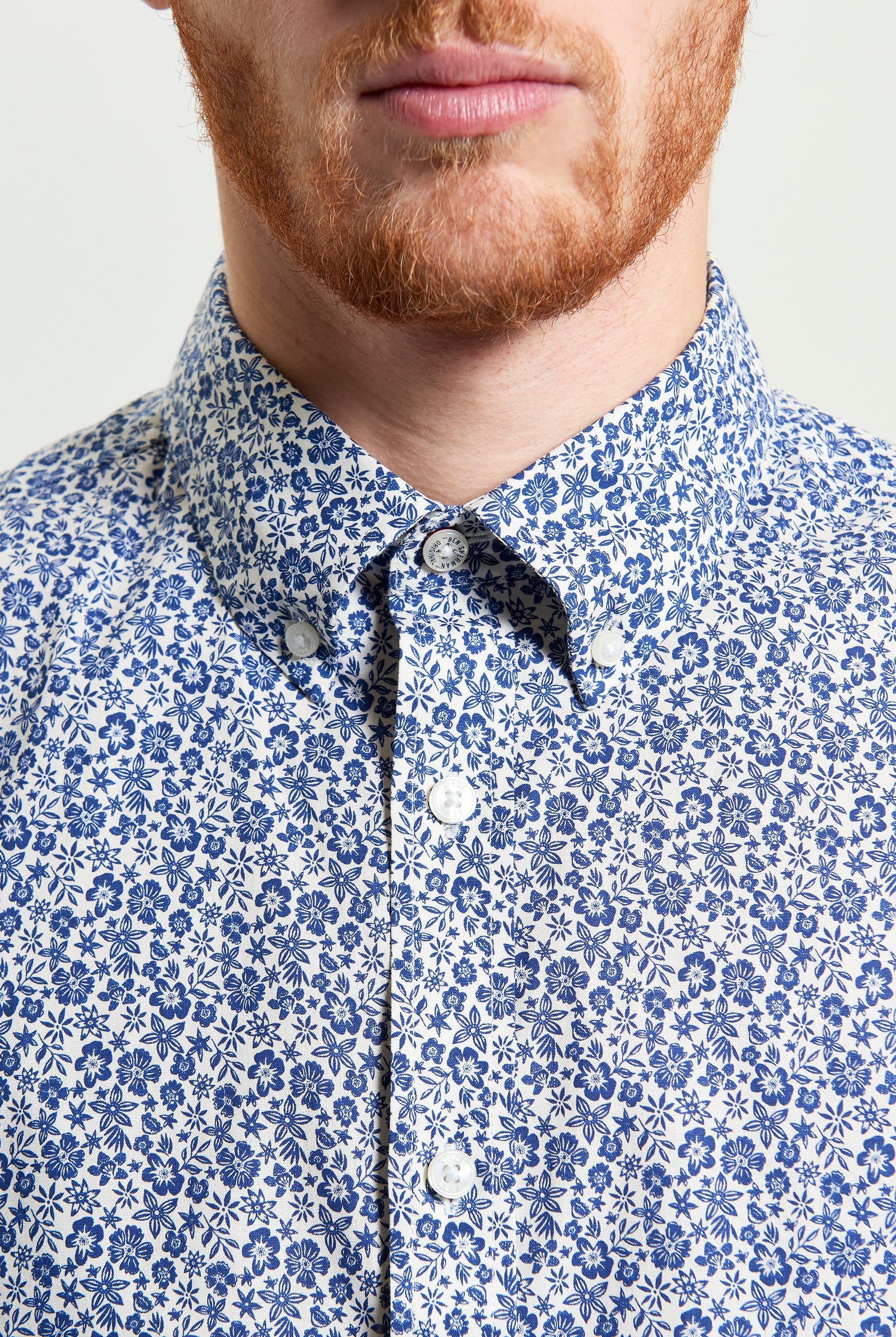 Mono Floral Print shirt featuring a tone-on-tone floral motif and two-finger button-down collar.