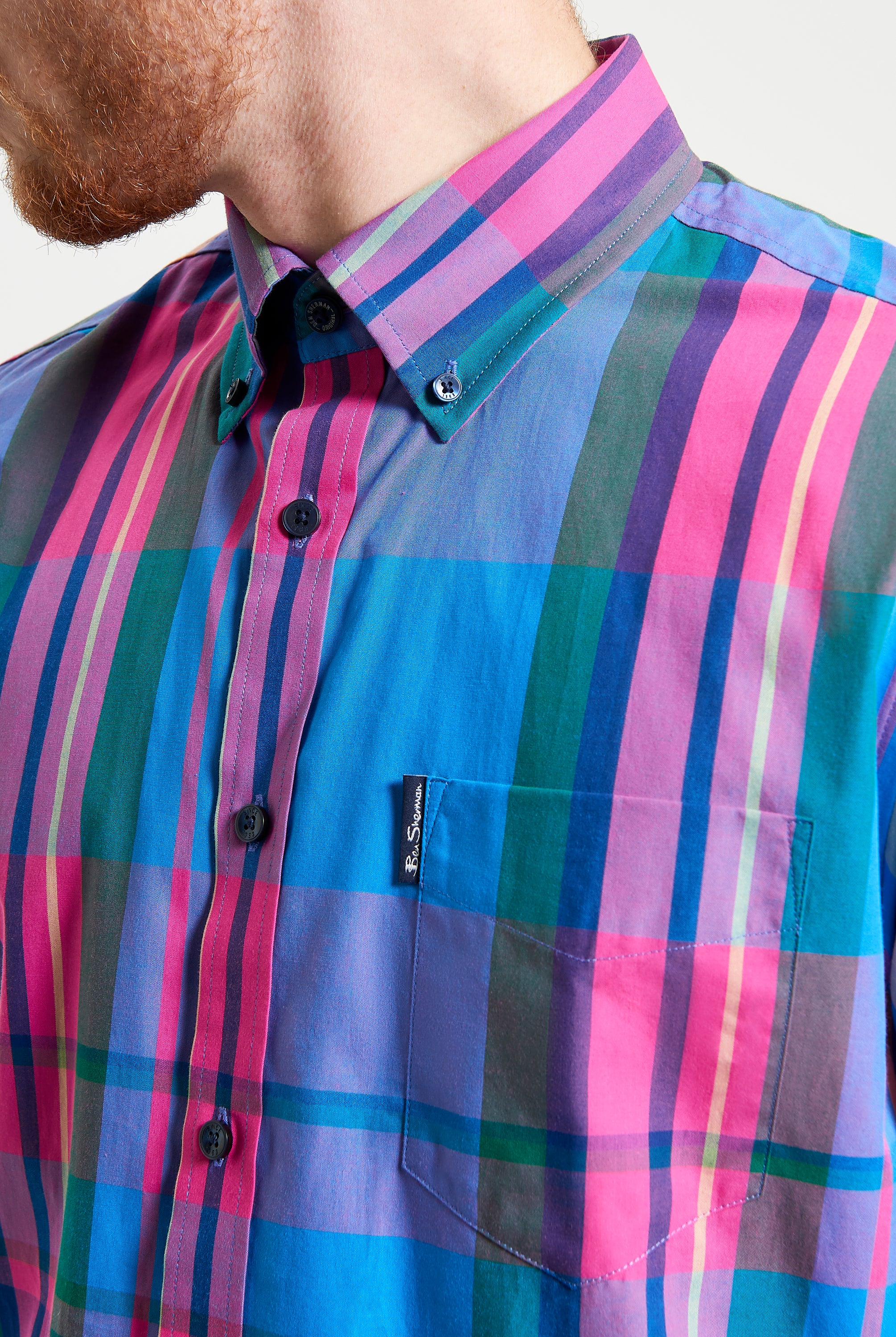 Large Madras Check short sleeve shirt showcasing vibrant plaid pattern and classic three-finger button-down collar.
