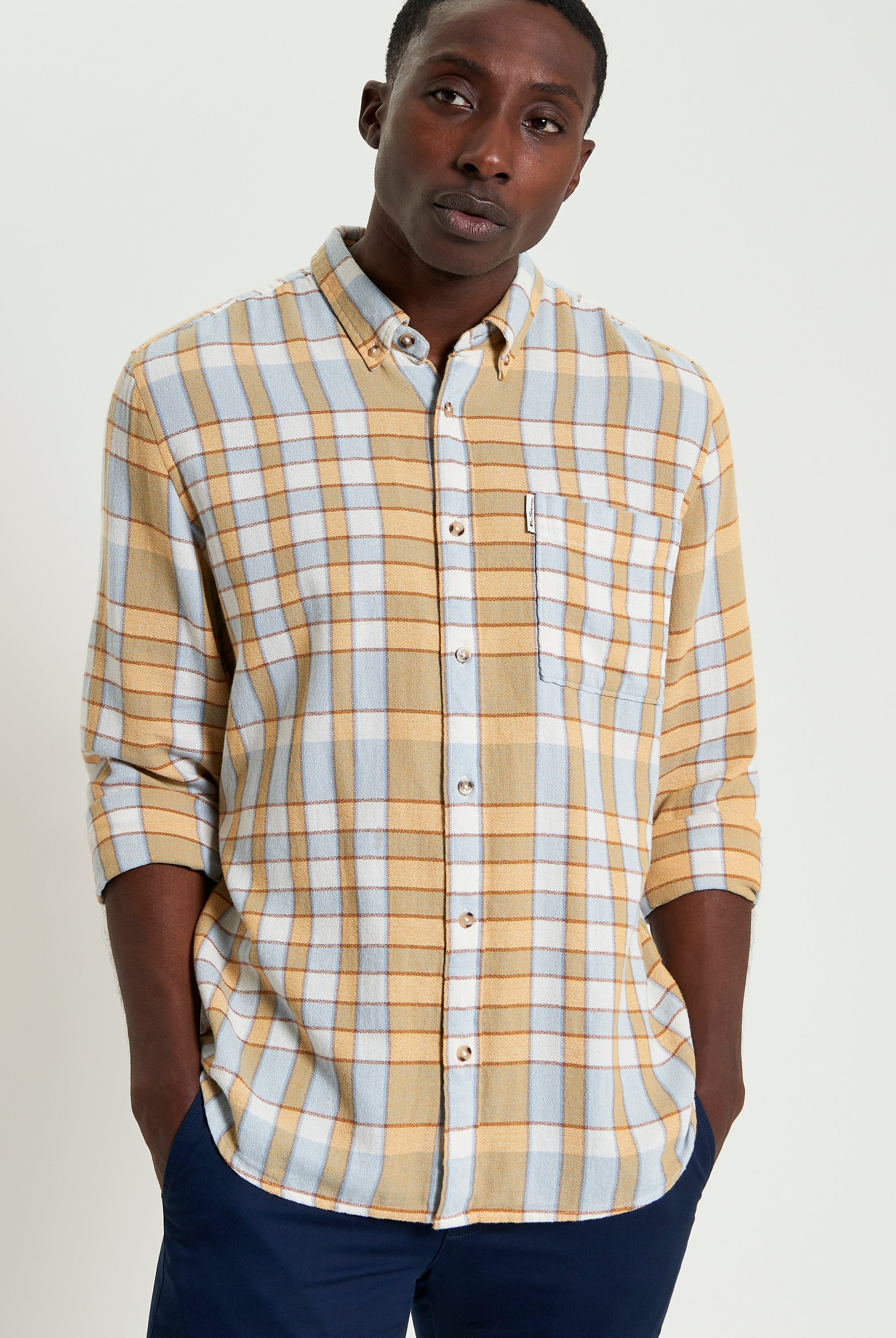 Crepe Check – yellow and blue check shirt with long sleeves and button-down collar.