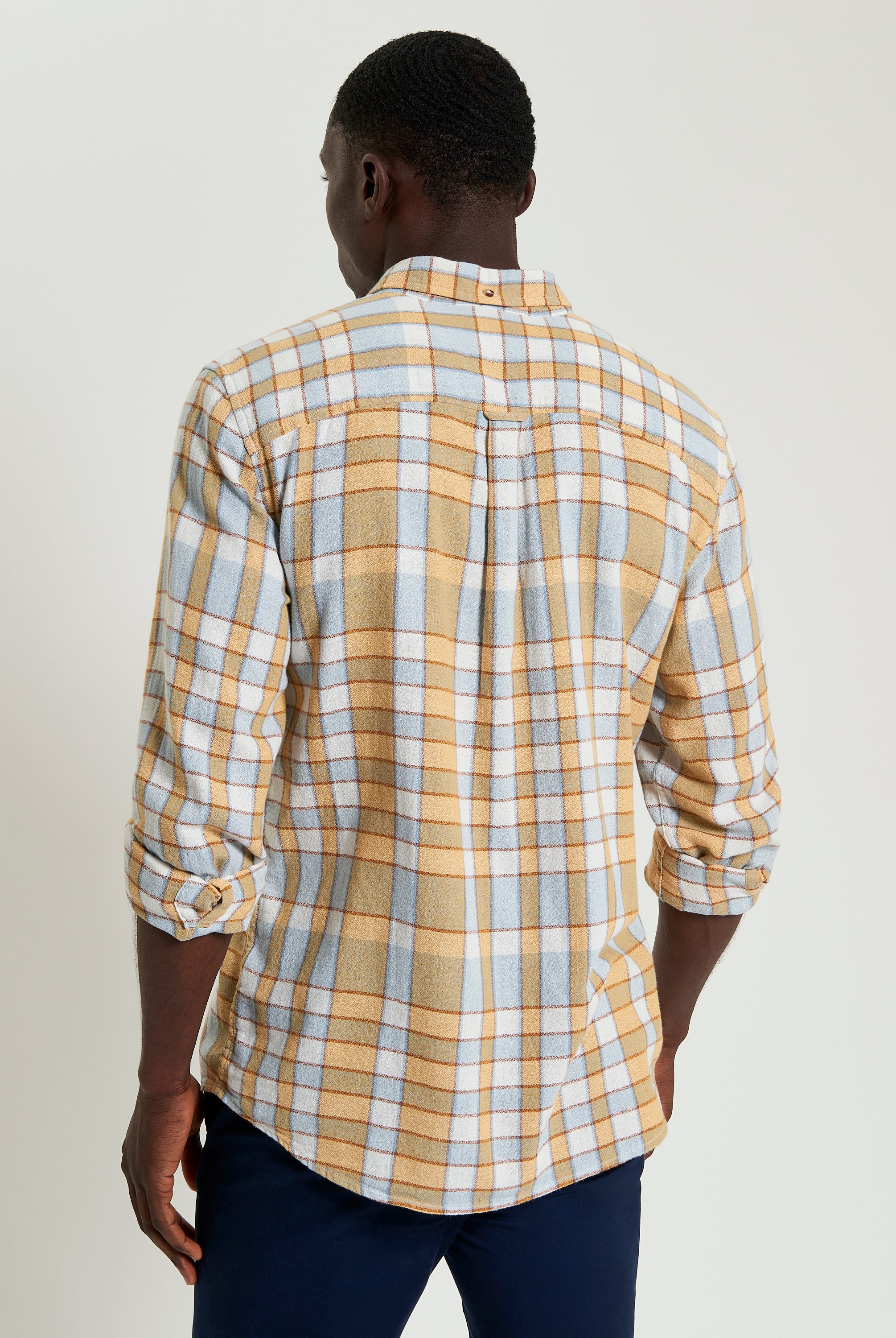 Crepe Check – Crisp cotton shirt with a check pattern and a two-finger button-down collar, viewed from the back.