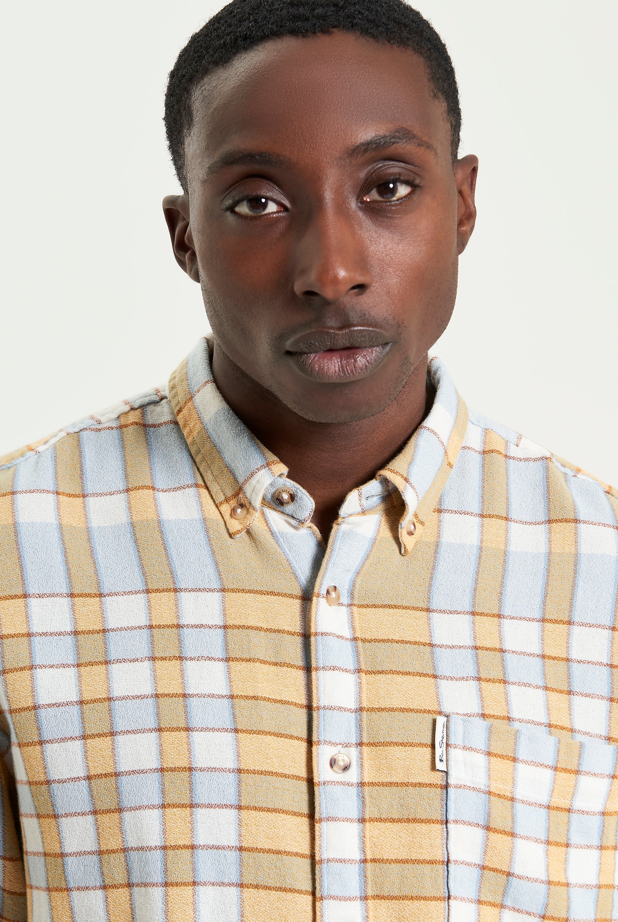 Crepe Check Shirt – Casual and textured cotton shirt with long sleeves and button-down collar.