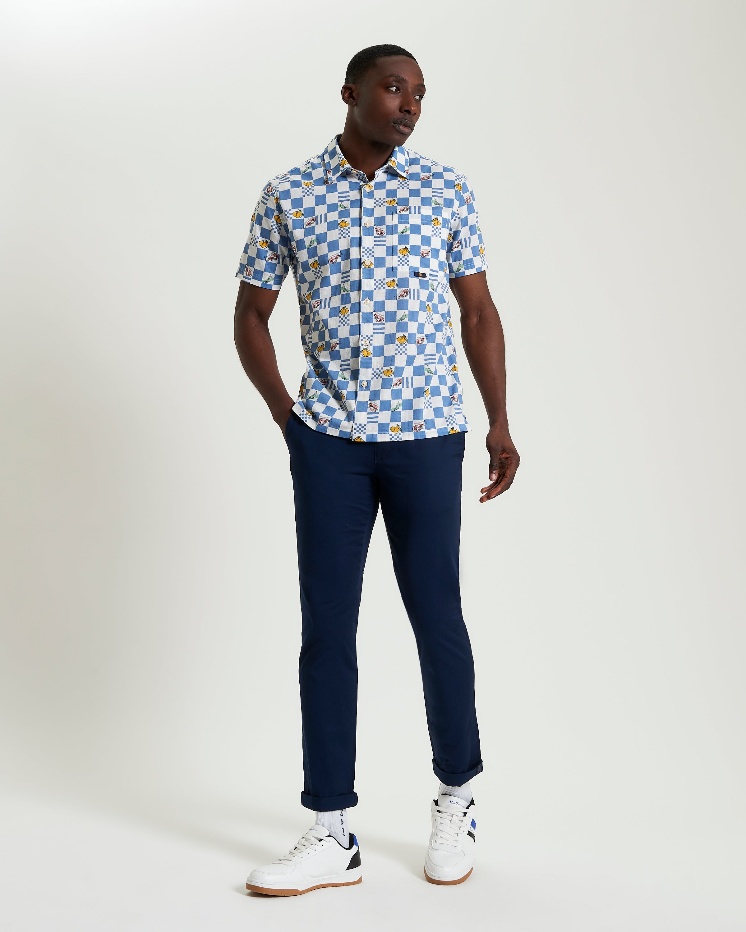 Chequerboard Print – Blue and White Shirt on Model – Casual Style with Graphic Edge