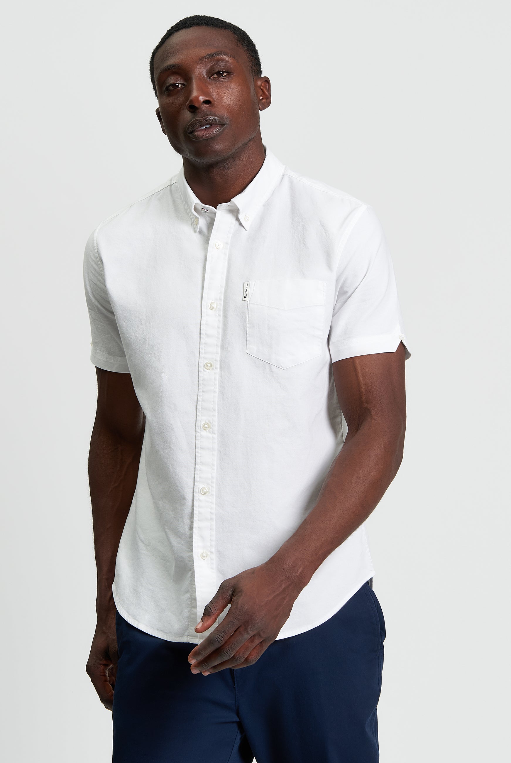 Signature Oxford Short Sleeve Shirt β White with short sleeves and chest pocket.