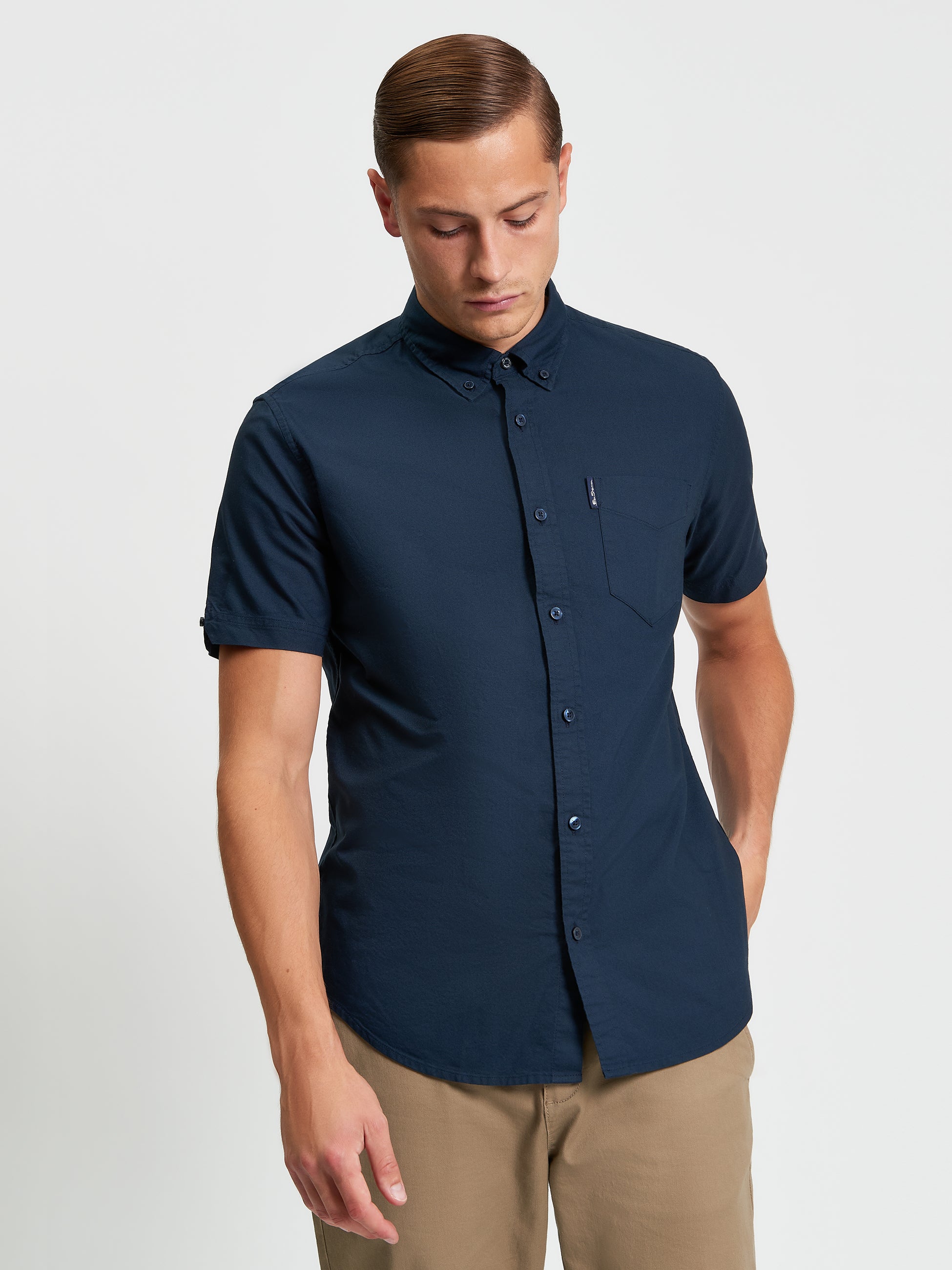 Signature Oxford Short Sleeve Shirt – Navy with short sleeves and chest pocket.