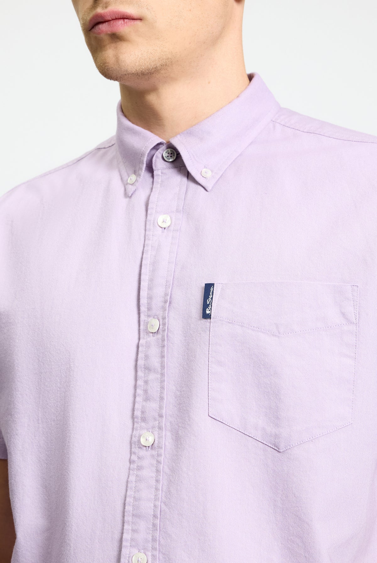 Signature Oxford Short Sleeve Shirt – light purple color with button-down collar and chest pocket detail.