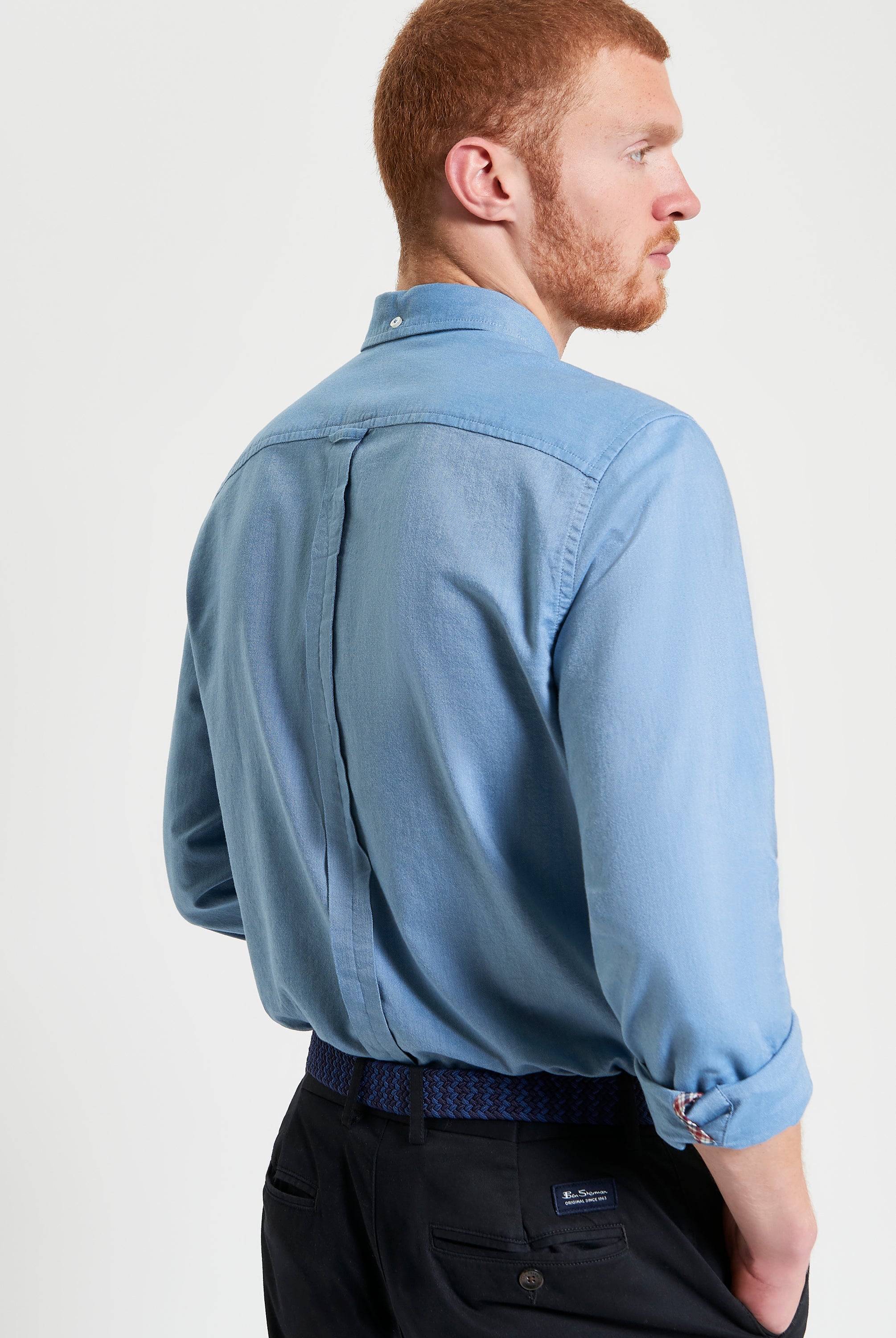 Signature Oxford Long Sleeve Shirt – blue – back view on model showing button-down collar and ease of movement.