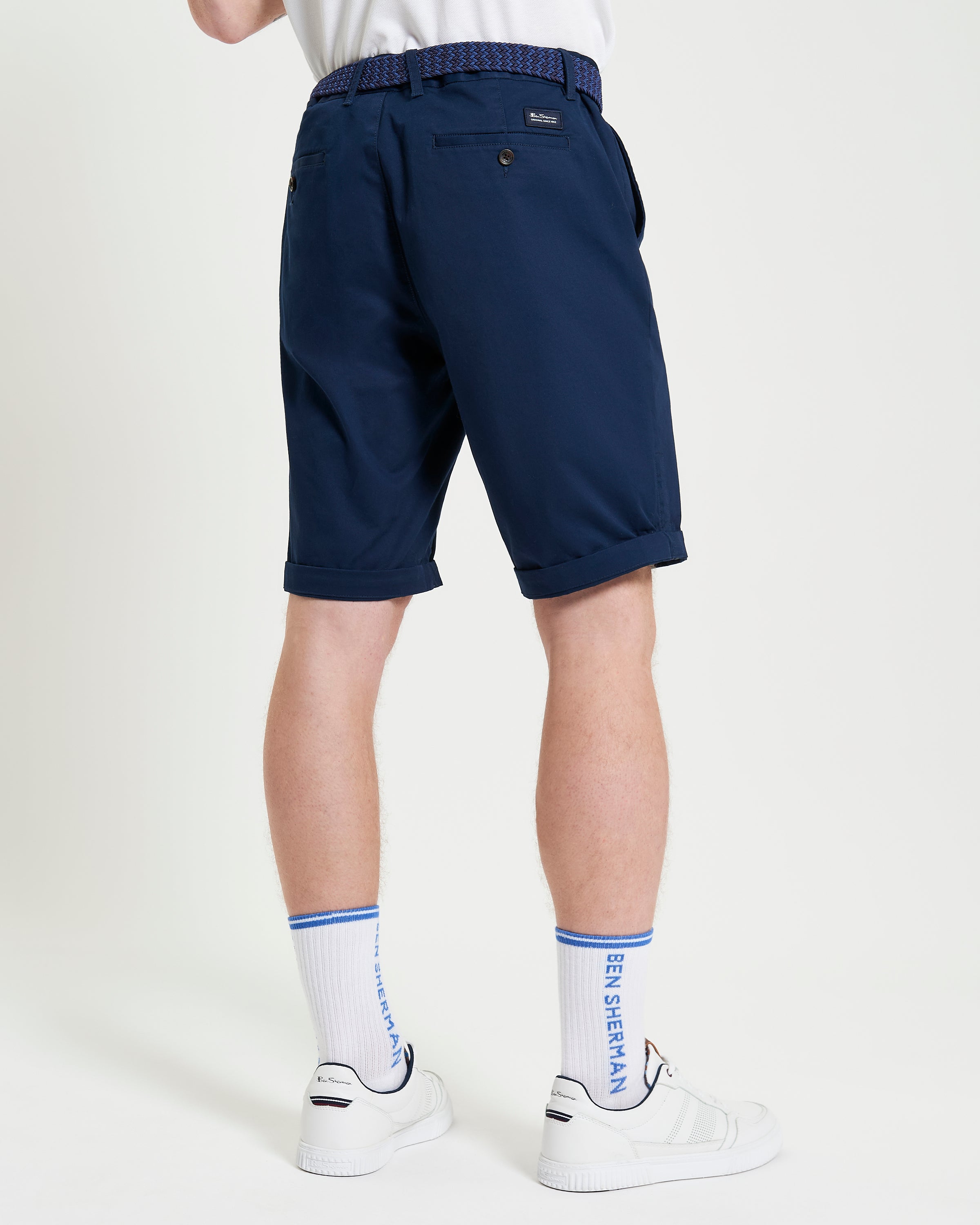 Signature Chino Short – navy blue, back view showcasing tailored style and structured fit.