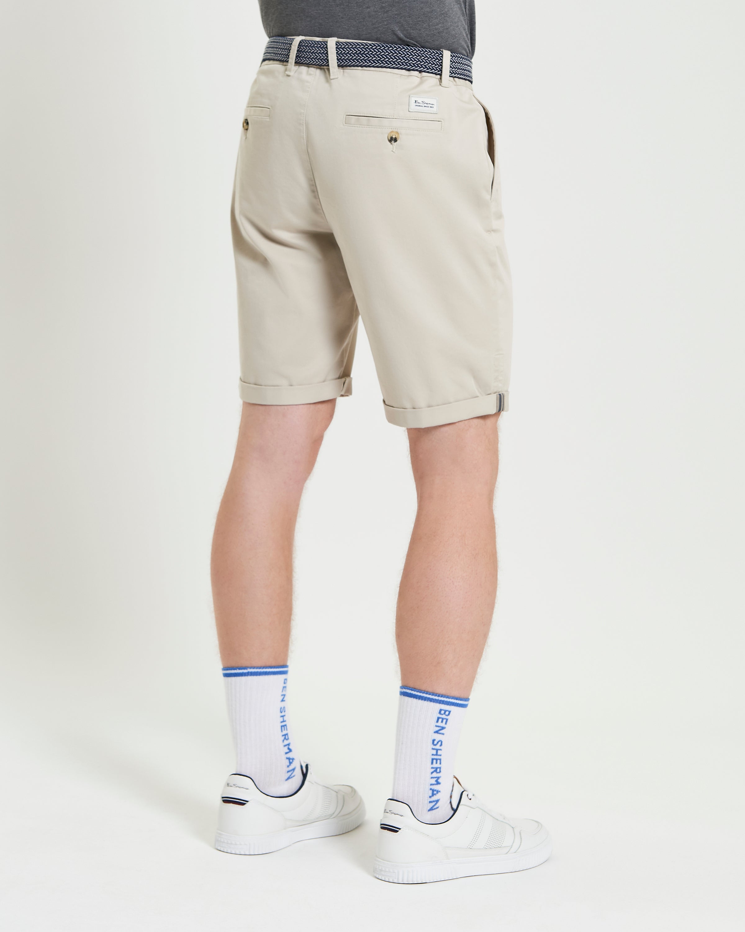 Signature Chino Short – beige back view showcasing the stylish hem detail and comfortable fit.