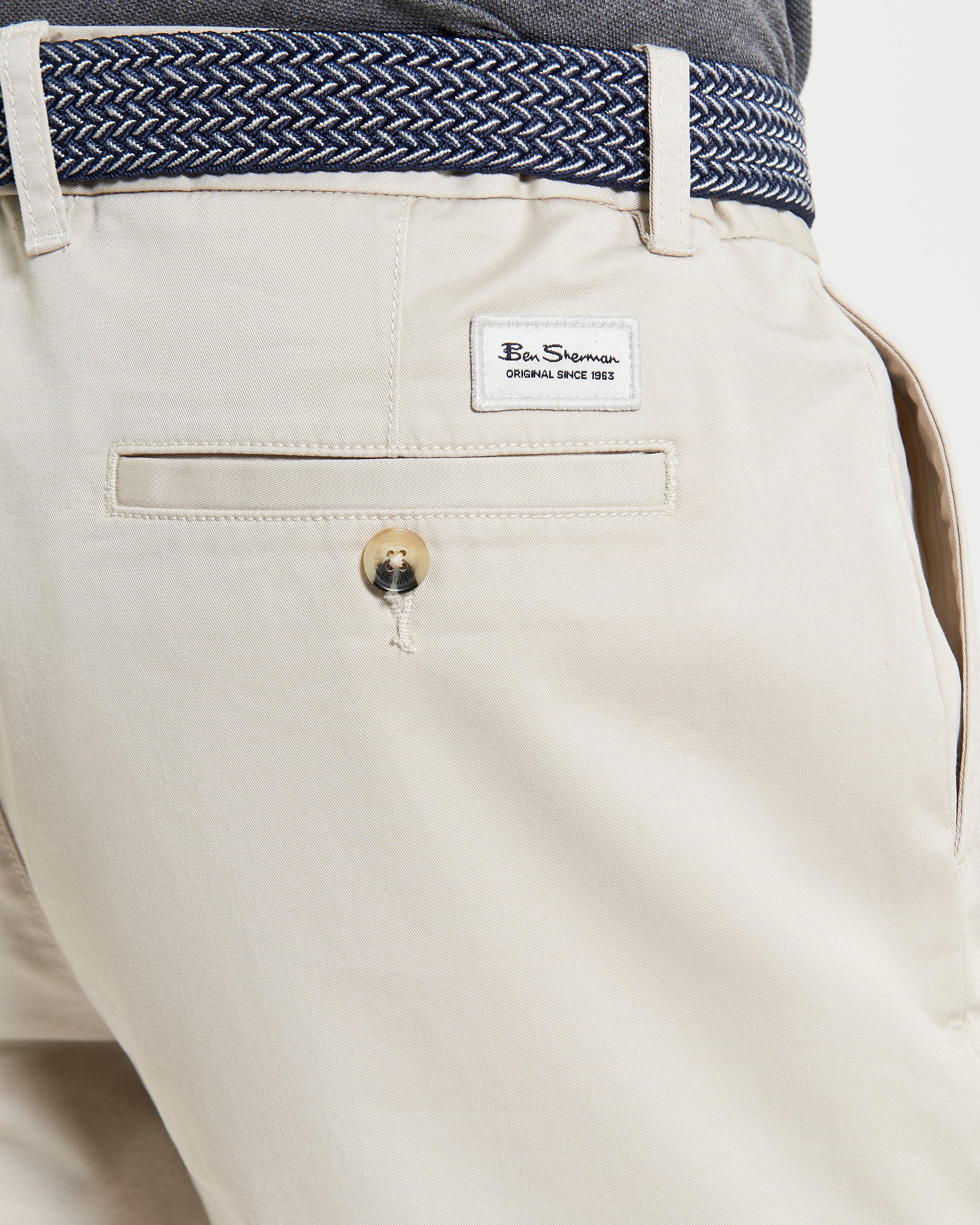 Back view of Signature Chino Short showcasing branded button and badge detail.