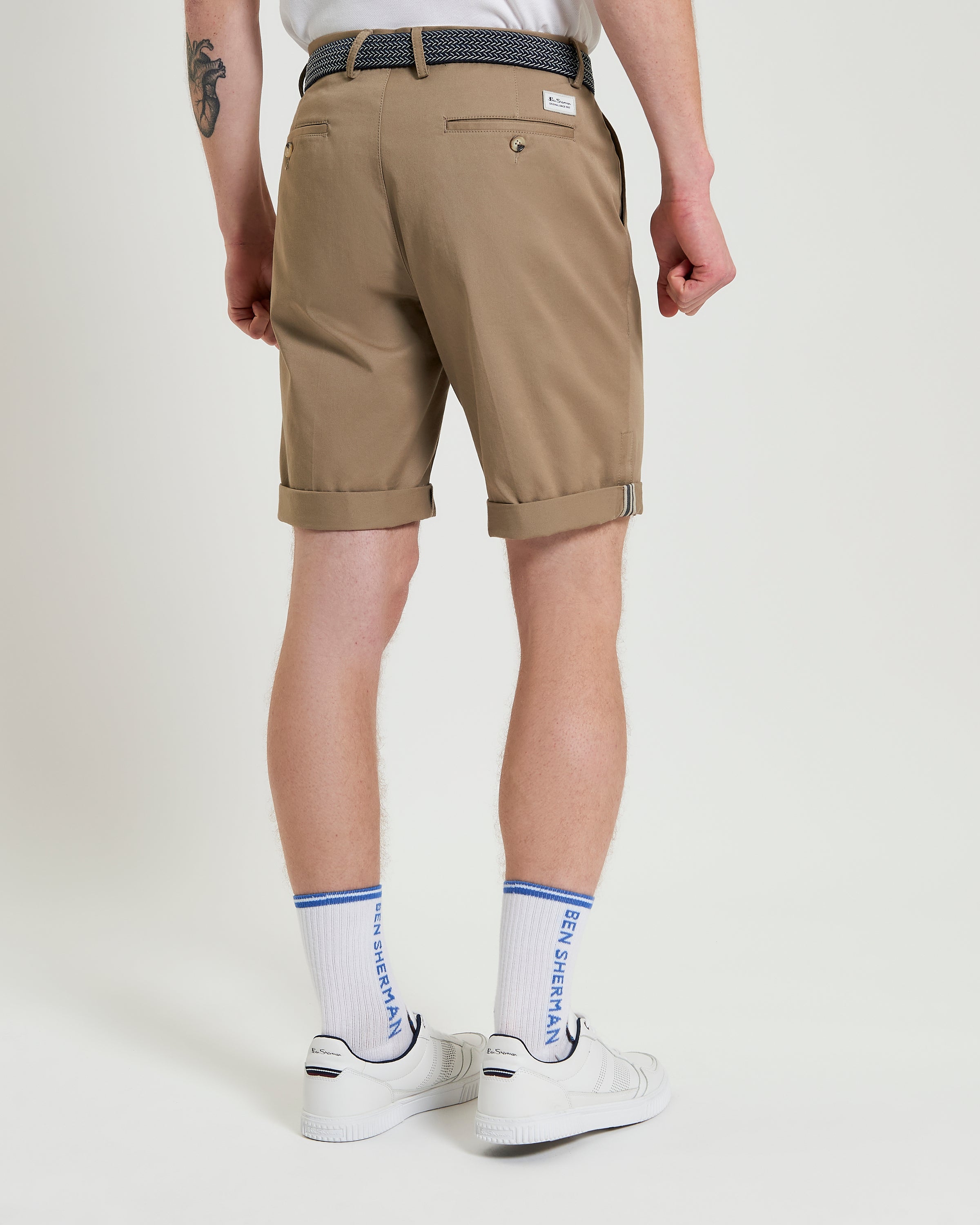Signature Chino Short – brown back view showing hem detail and stylish design.