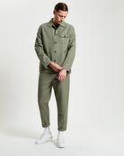 Linen Cotton Trouser – olive green – slim fit trousers paired with a matching jacket for a stylish warm-weather look.