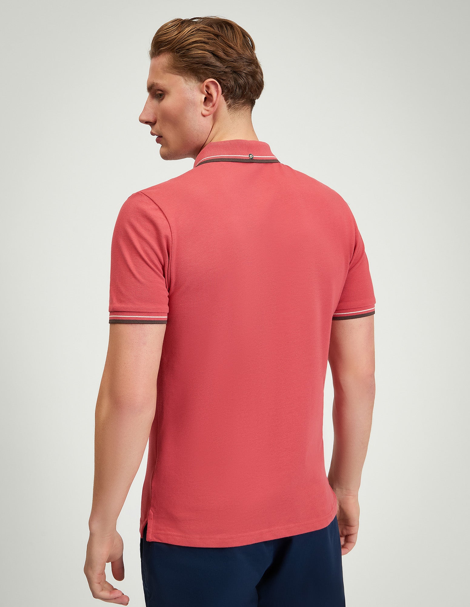 Signature Pique Polo – back view showing refined design and contrast detailing.