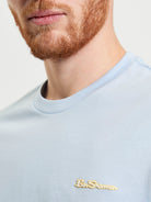 Signature Tee – Light Blue – Crew Neck with branded badge on chest