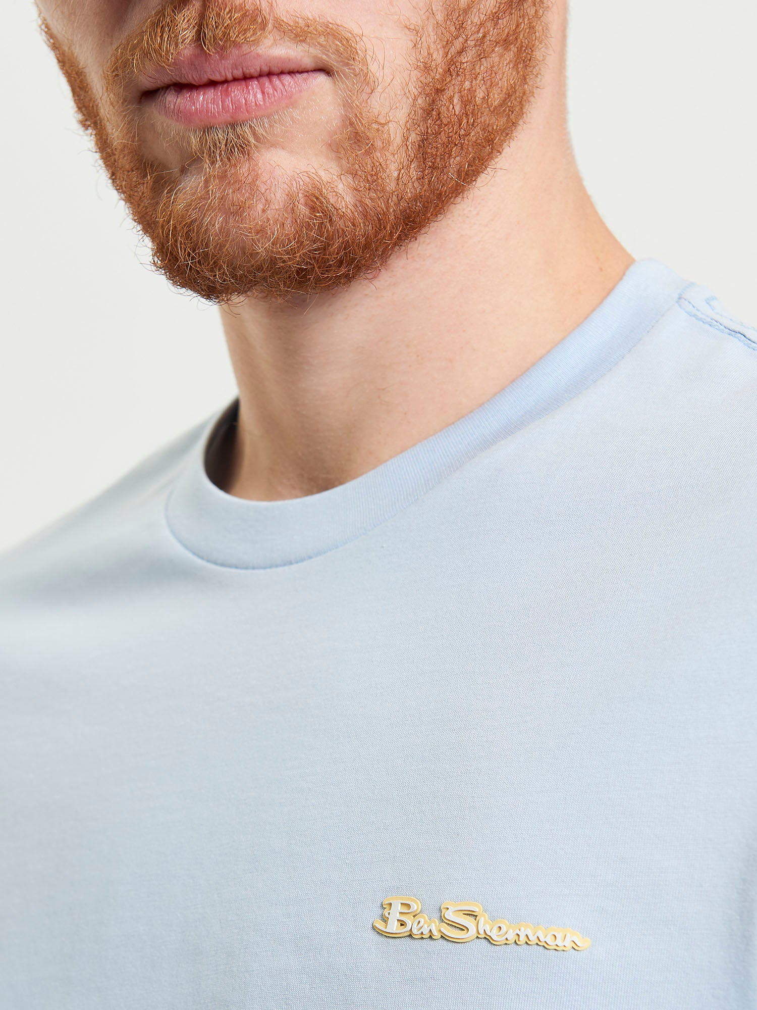 Signature Tee – Light Blue – Crew Neck with branded badge on chest