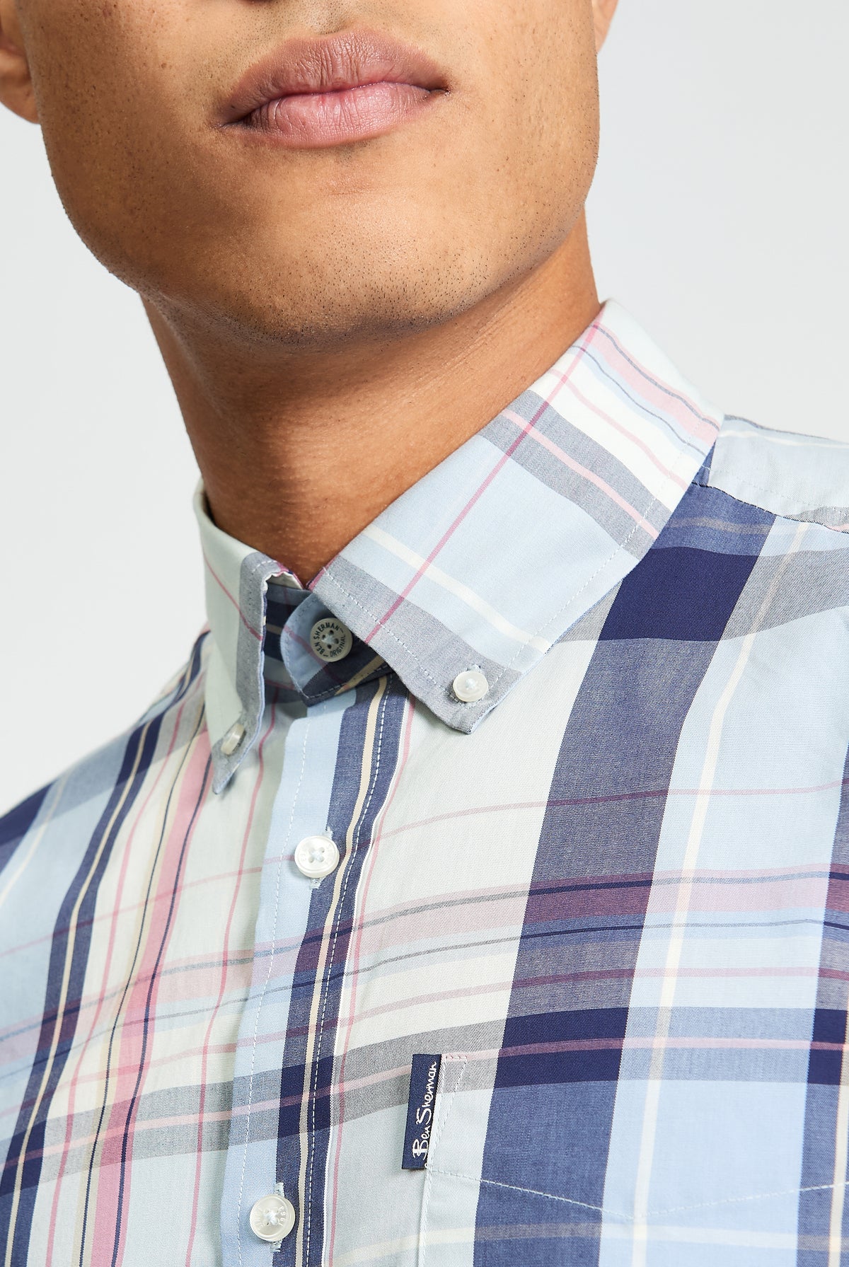 Oversized Check shirt with a relaxed fit and modern style, featuring a button-down collar and colorful plaid pattern.