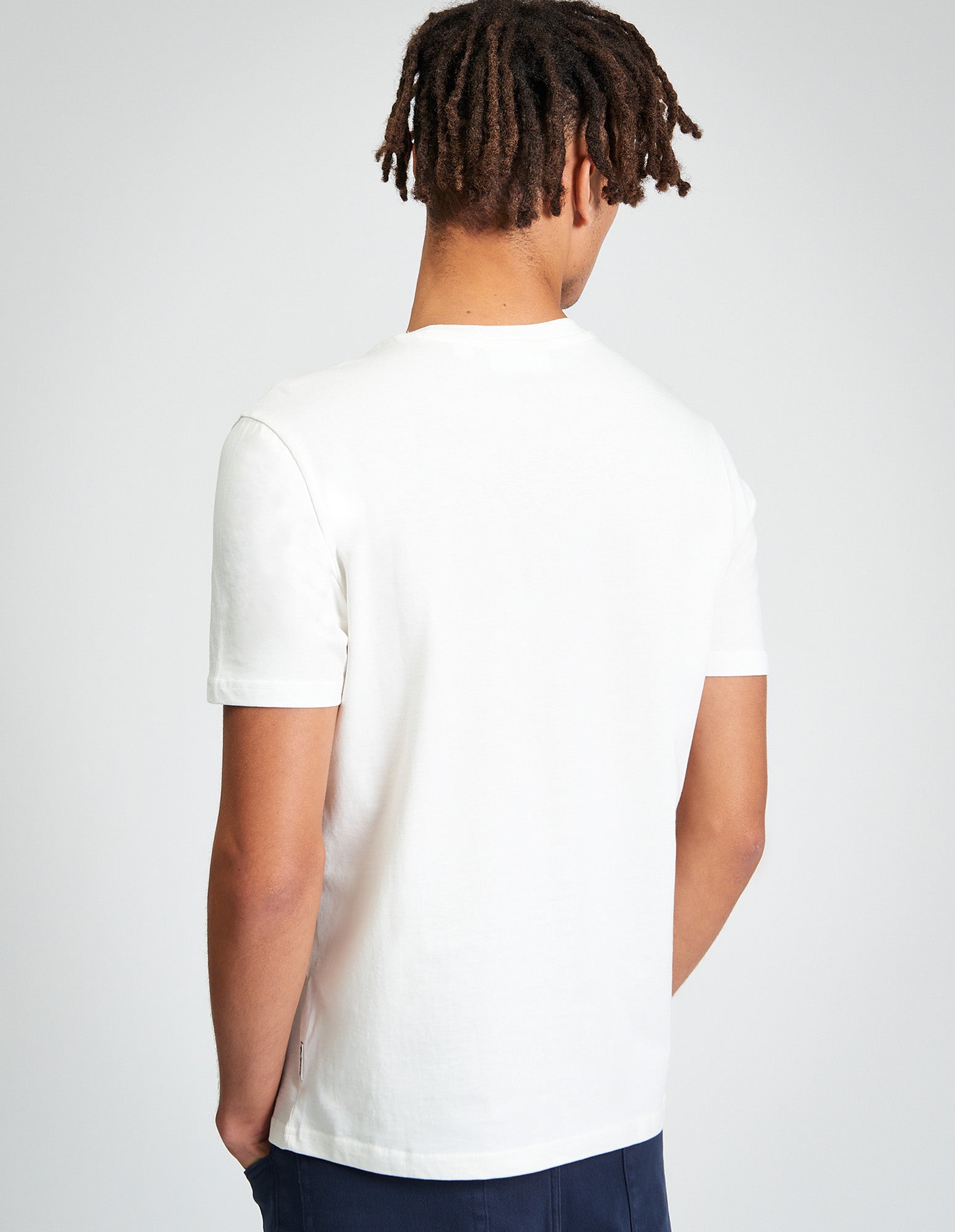 Back view of the Hidden Treasures Tee, made from 100% organic cotton, showcasing a regular fit.