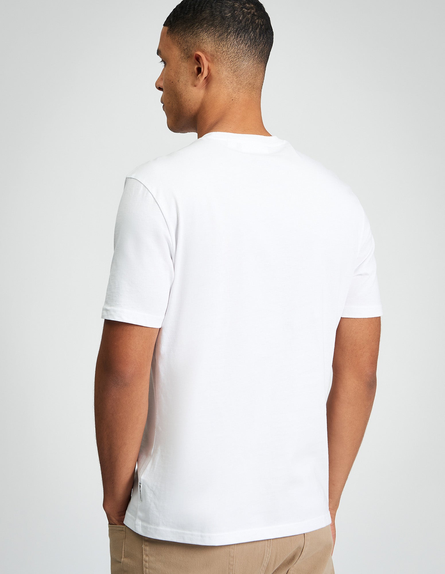 Seaside Sessions Tee – back view of a man wearing a white organic cotton t-shirt by Ben Sherman.