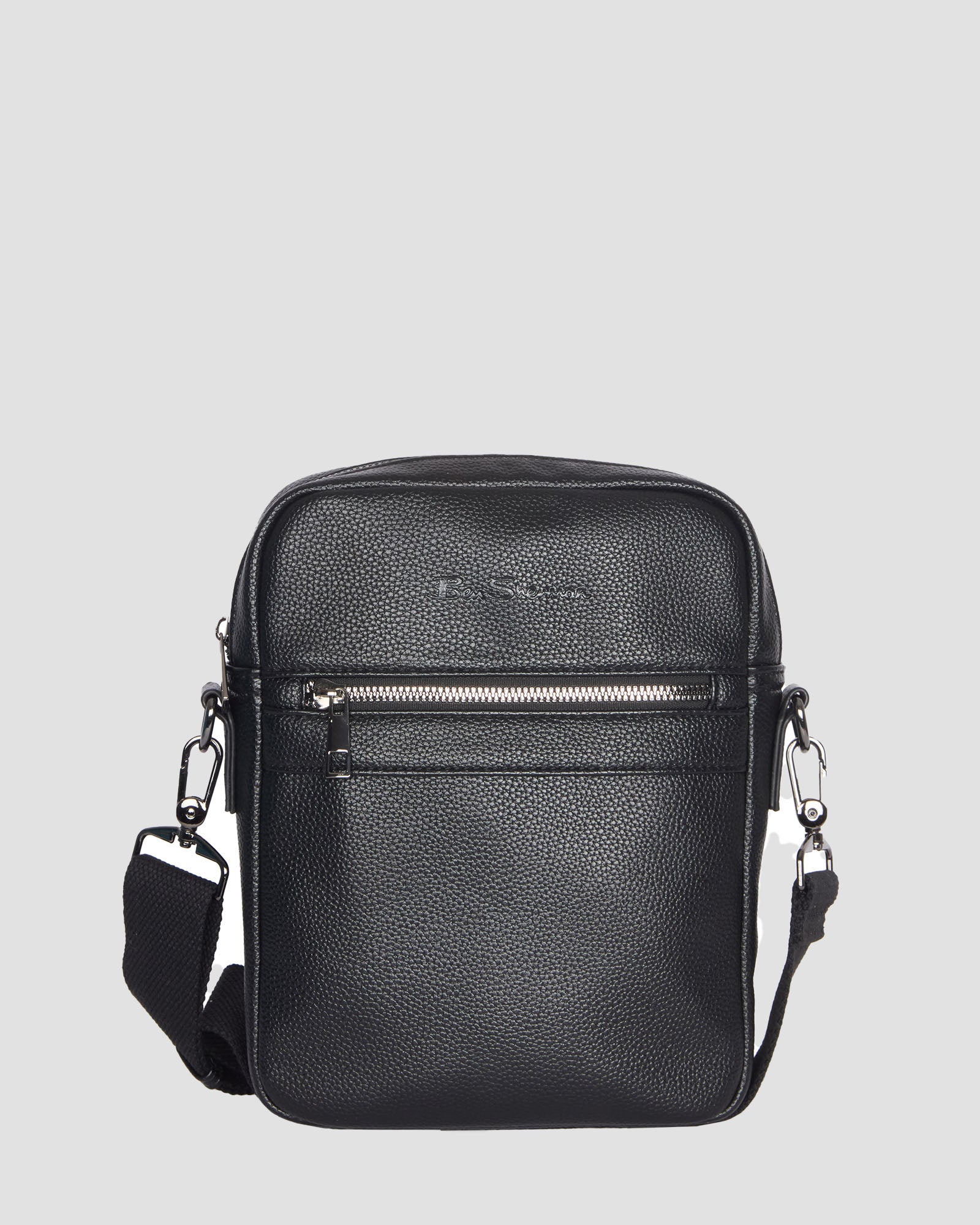 Pebble Cross Body Bag – classic black leather look with adjustable strap and embossed branding