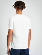 Signature Target Tee – white – back view of a model wearing a comfortable regular fit shirt made from organic cotton.