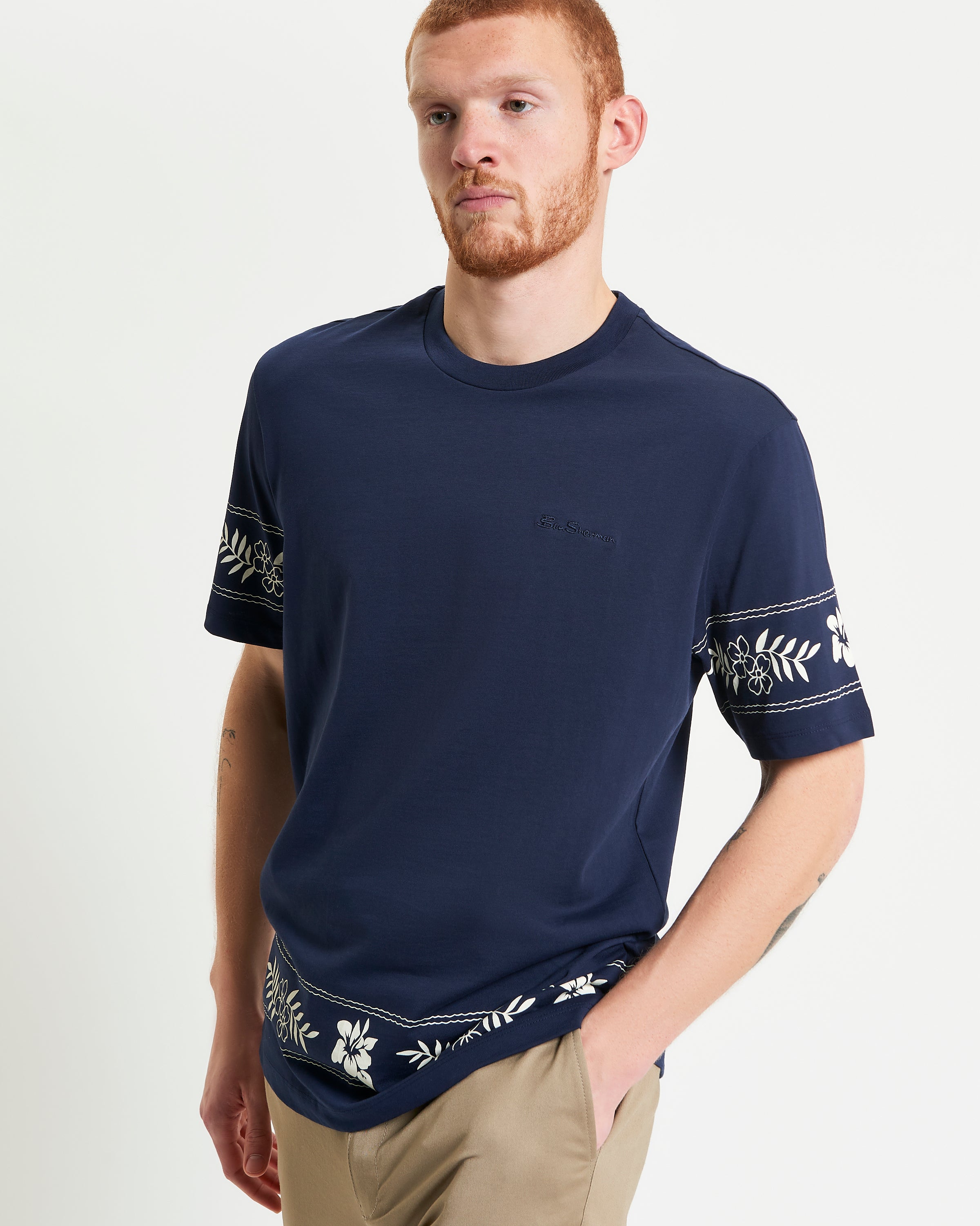 Border Print Tee – Navy with floral border print and tonal embroidery