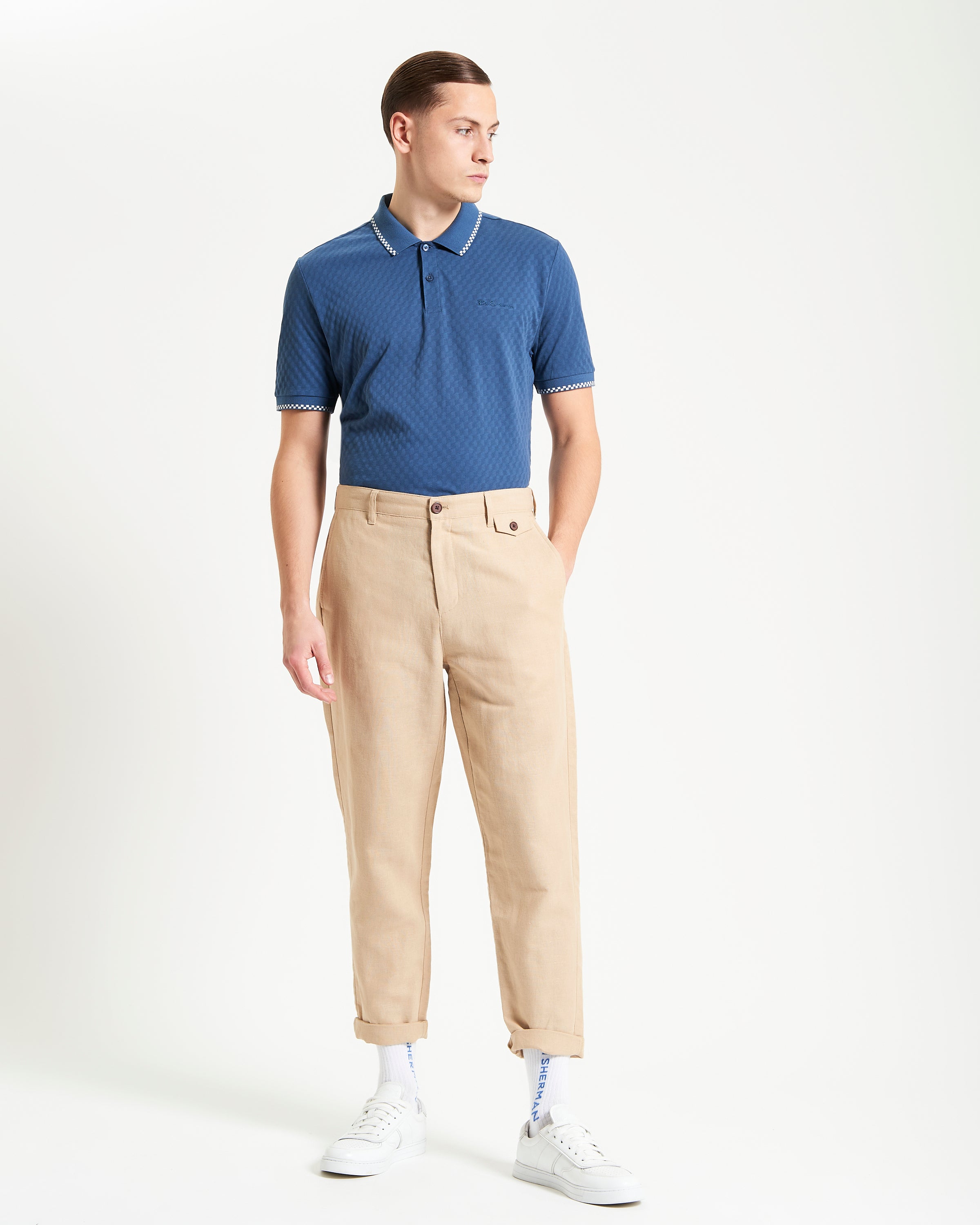 Chequerboard Texture Polo by Ben Sherman in blue with relaxed fit and two button placket.