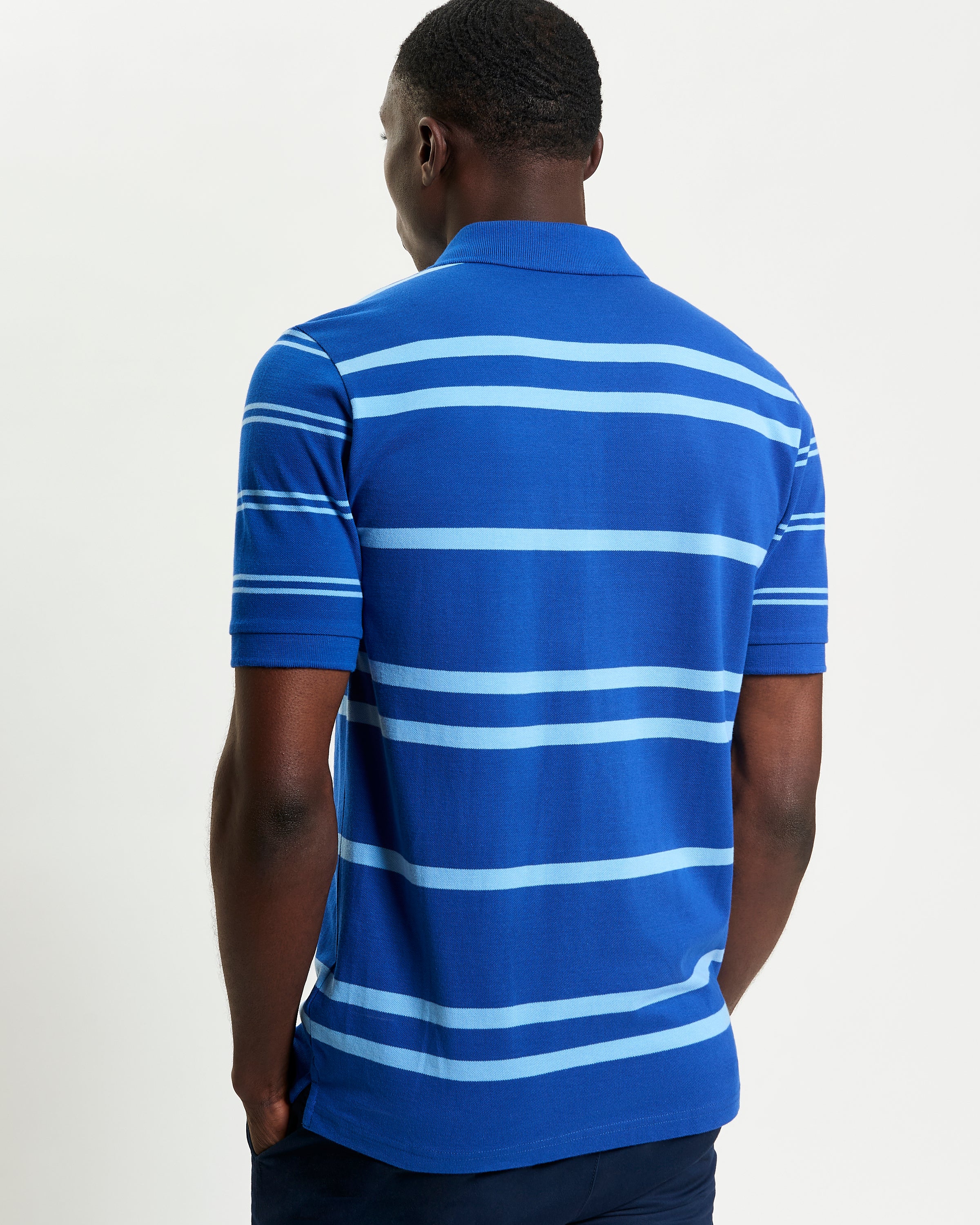 Mixed Stripe Polo – blue with horizontal stripes, back view highlighting relaxed fit and comfort.
