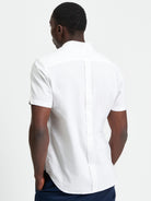 Signature Oxford Short Sleeve Shirt – Back view showcasing the minimalist design and organic cotton fabric.