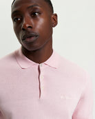 Signature Short Sleeve Polo – pink with ribbed collar, featuring Ben Sherman woven label and sleek fit.