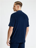 Towelling Button Through Shirt – Back view of model in navy cotton shirt by Ben Sherman.