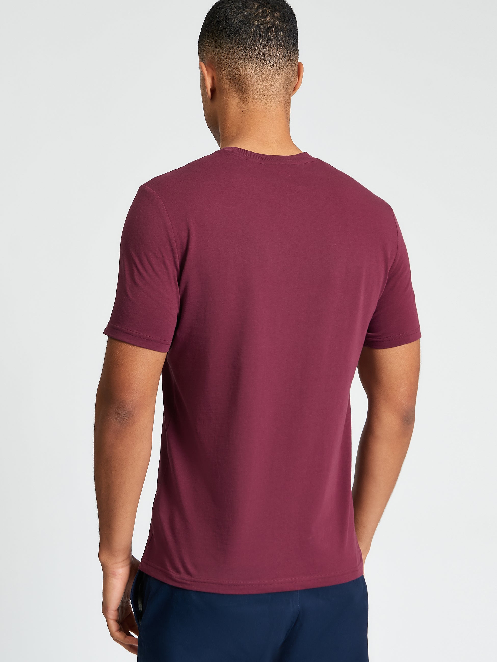 Core Stripe Tee – back view of a regular-fit t-shirt in burgundy, made from 100% organic cotton.
