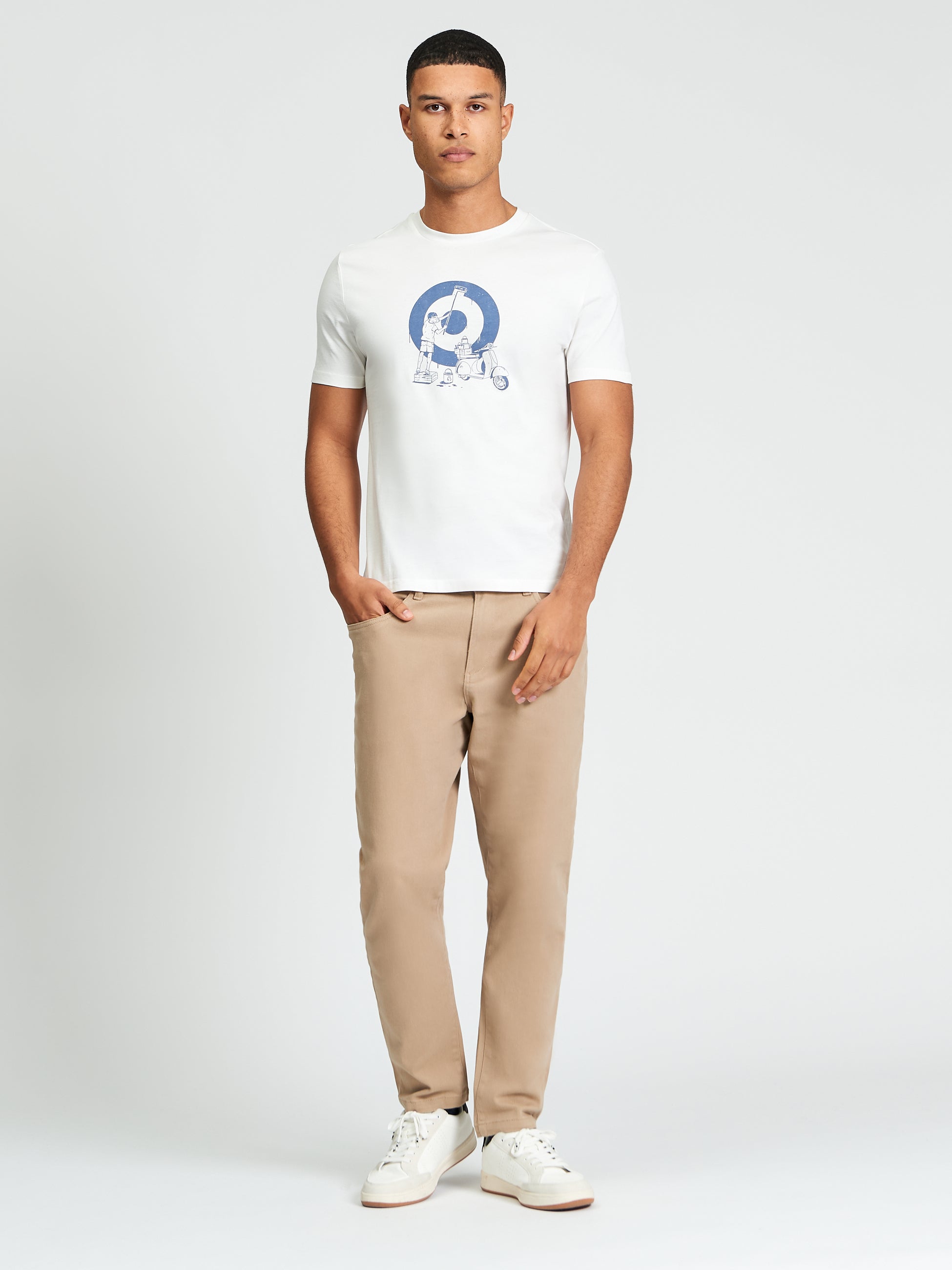 Rascal Target Tee – Art-inspired graphic print on a model, showcasing a casual style with 100% organic cotton.
