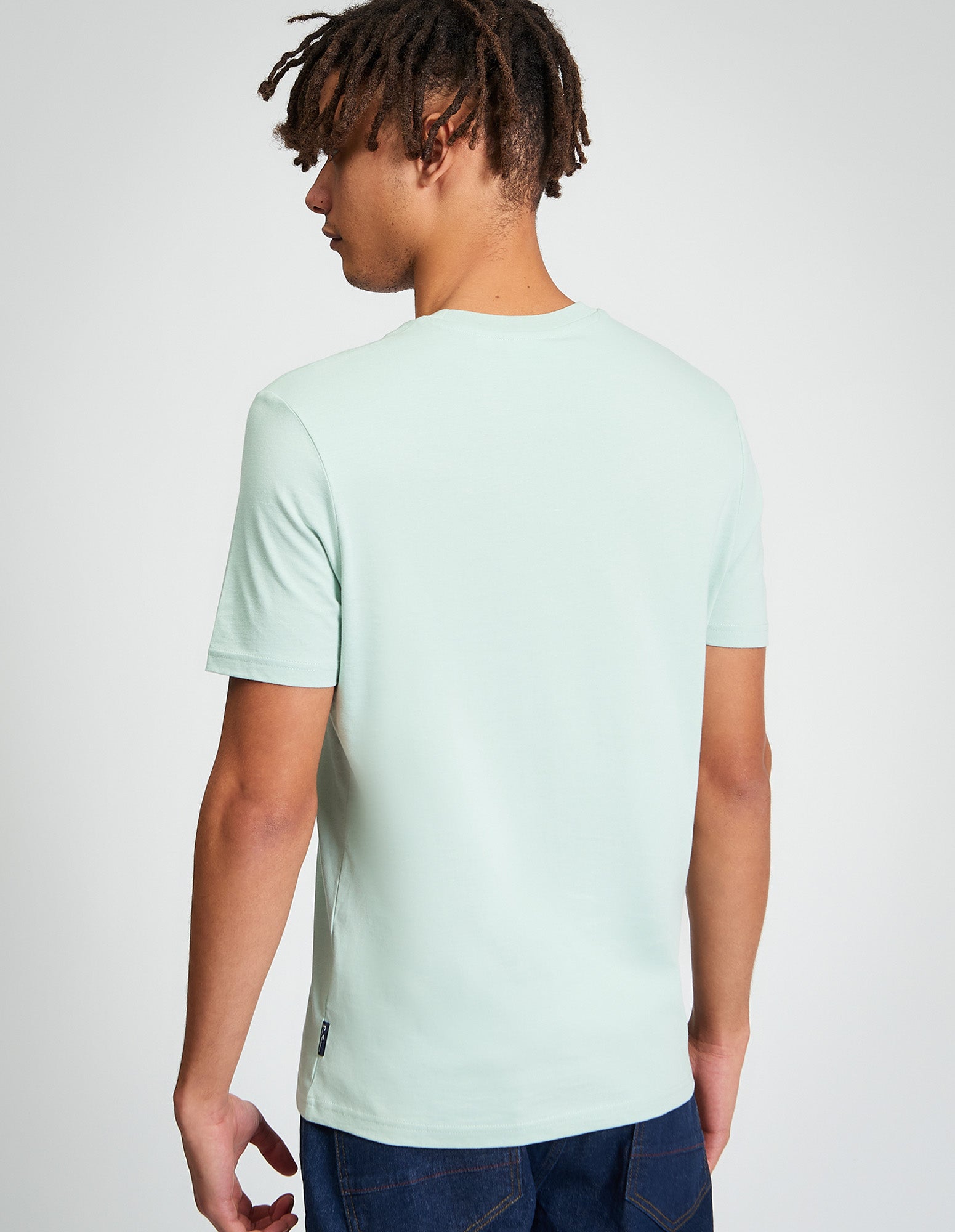 Comic Target Tee – back view of model wearing the tee in mint green color.