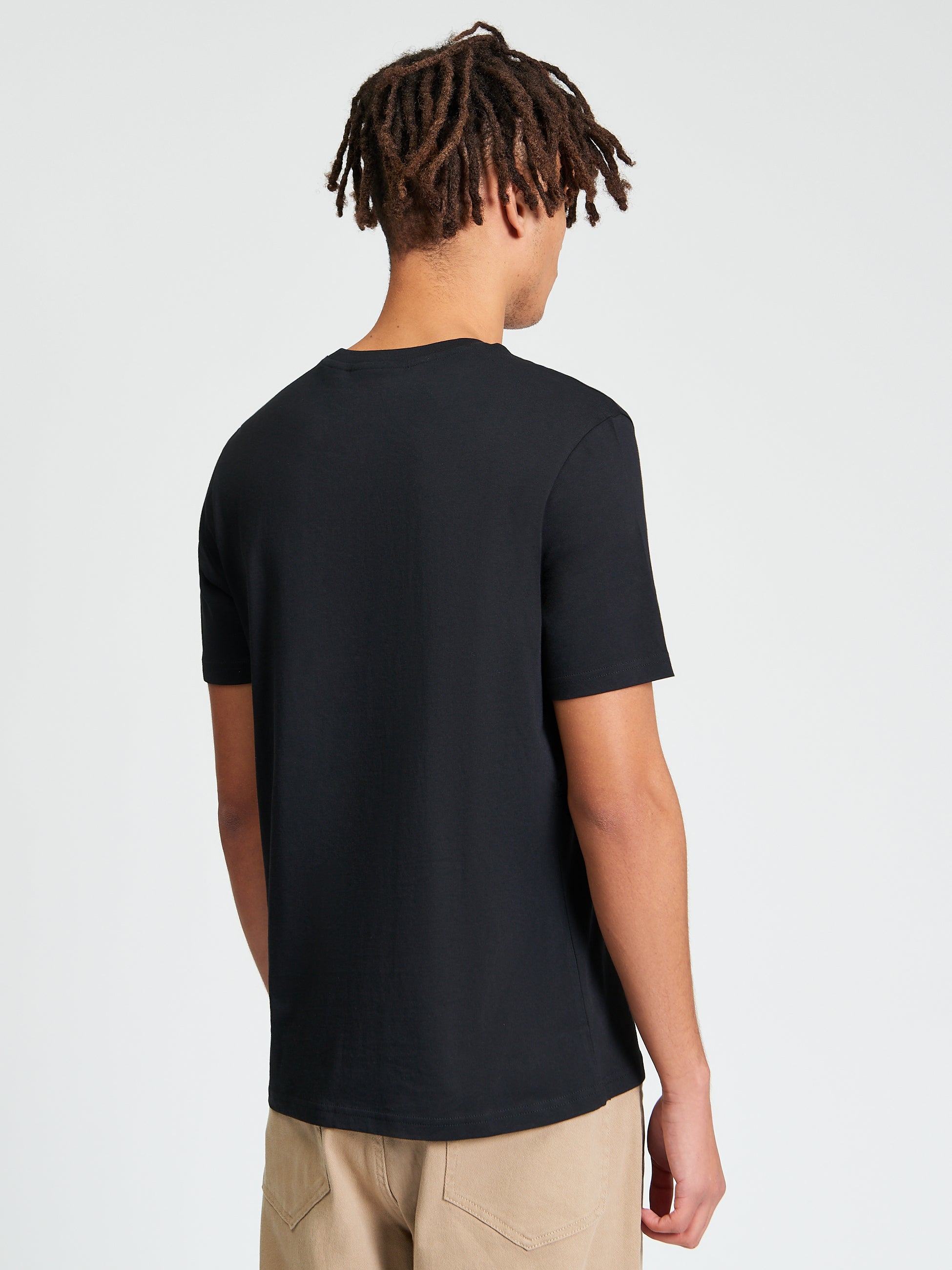 Bully Tee – black organic cotton t-shirt showcasing a stylish back view with short sleeves.