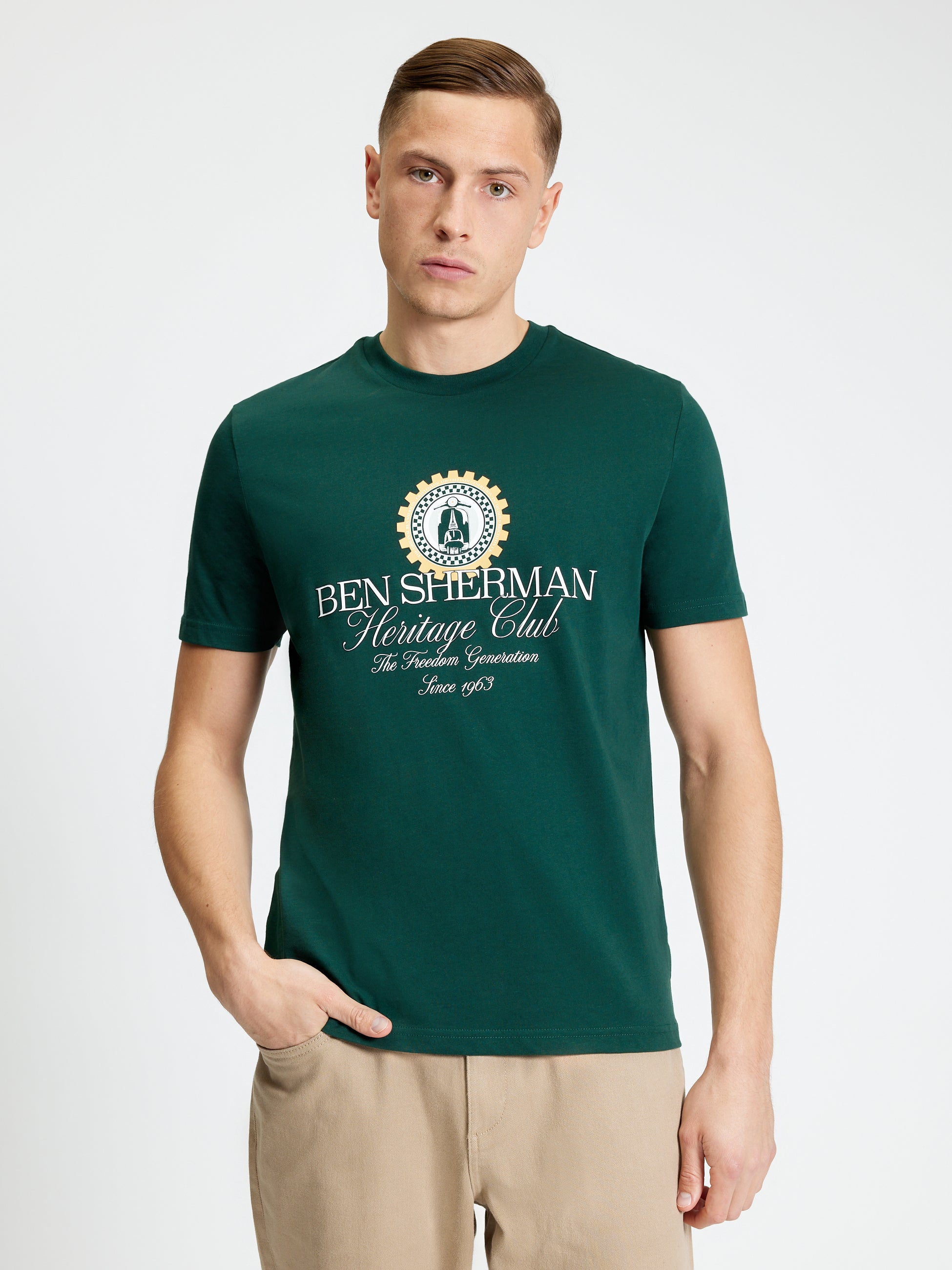 Heritage Club Tee – Ben Sherman model wearing green t-shirt with bold graphic print.