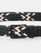 WOVEN BELT – black and white braided design with sleek buckle detail.